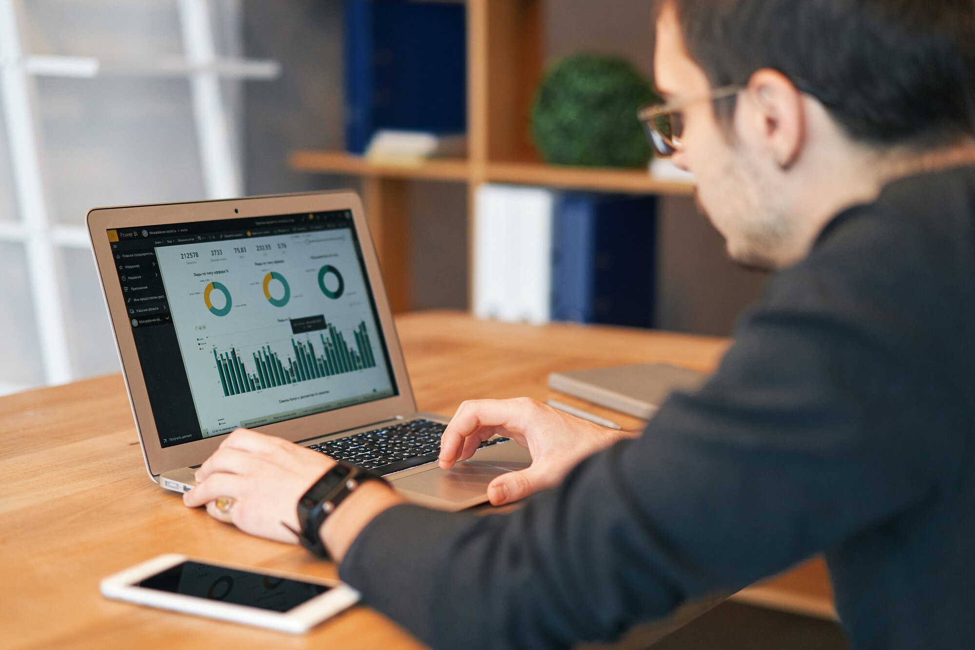 Laying the Groundwork: Why Technical SEO is Crucial for Your Digital Success 4 closeup of man working on laptop with finances or 7ad3a2f288236553cb8d