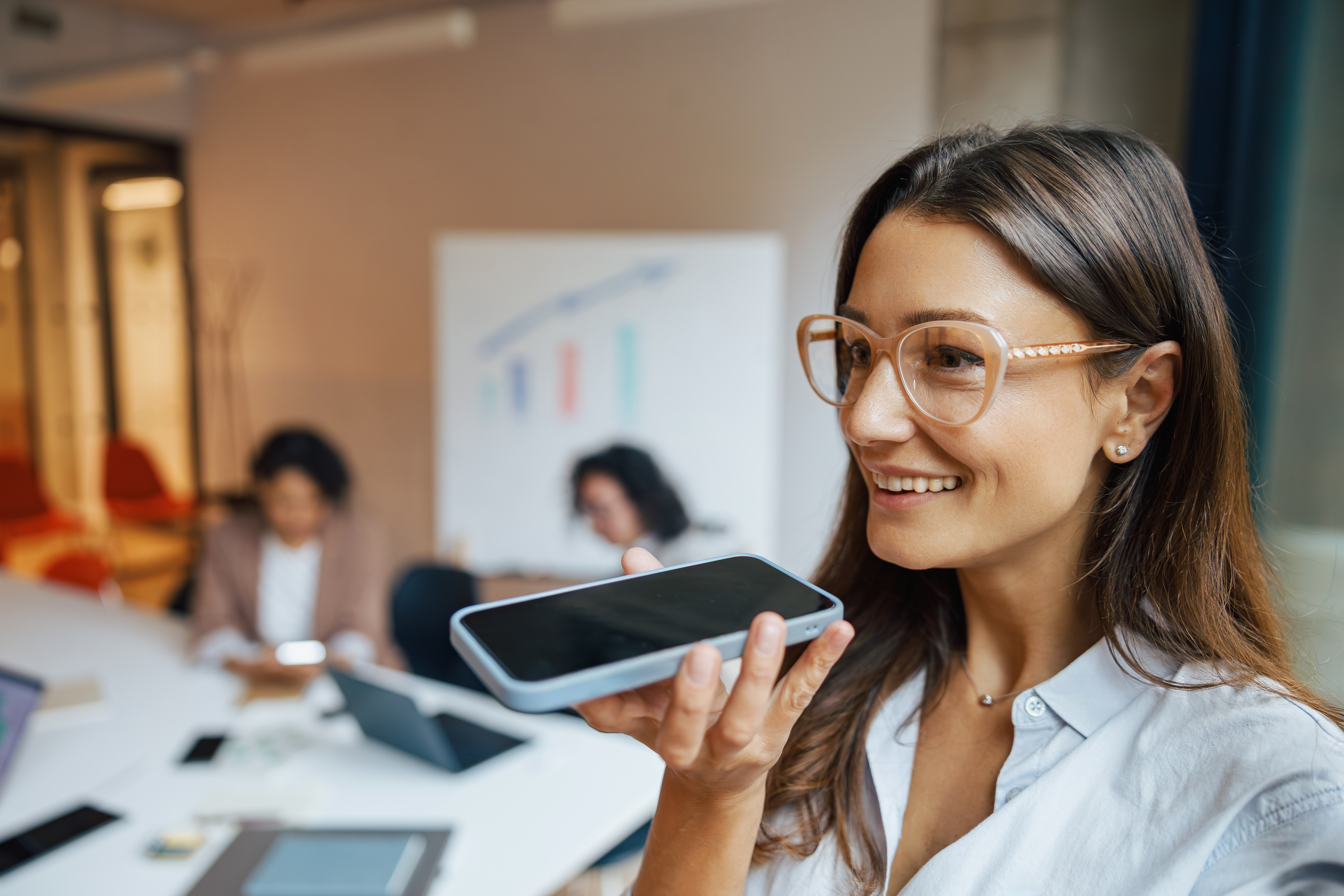 a businesswoman effectively engaged in voice comma 0ae39286f09e33cb40ec