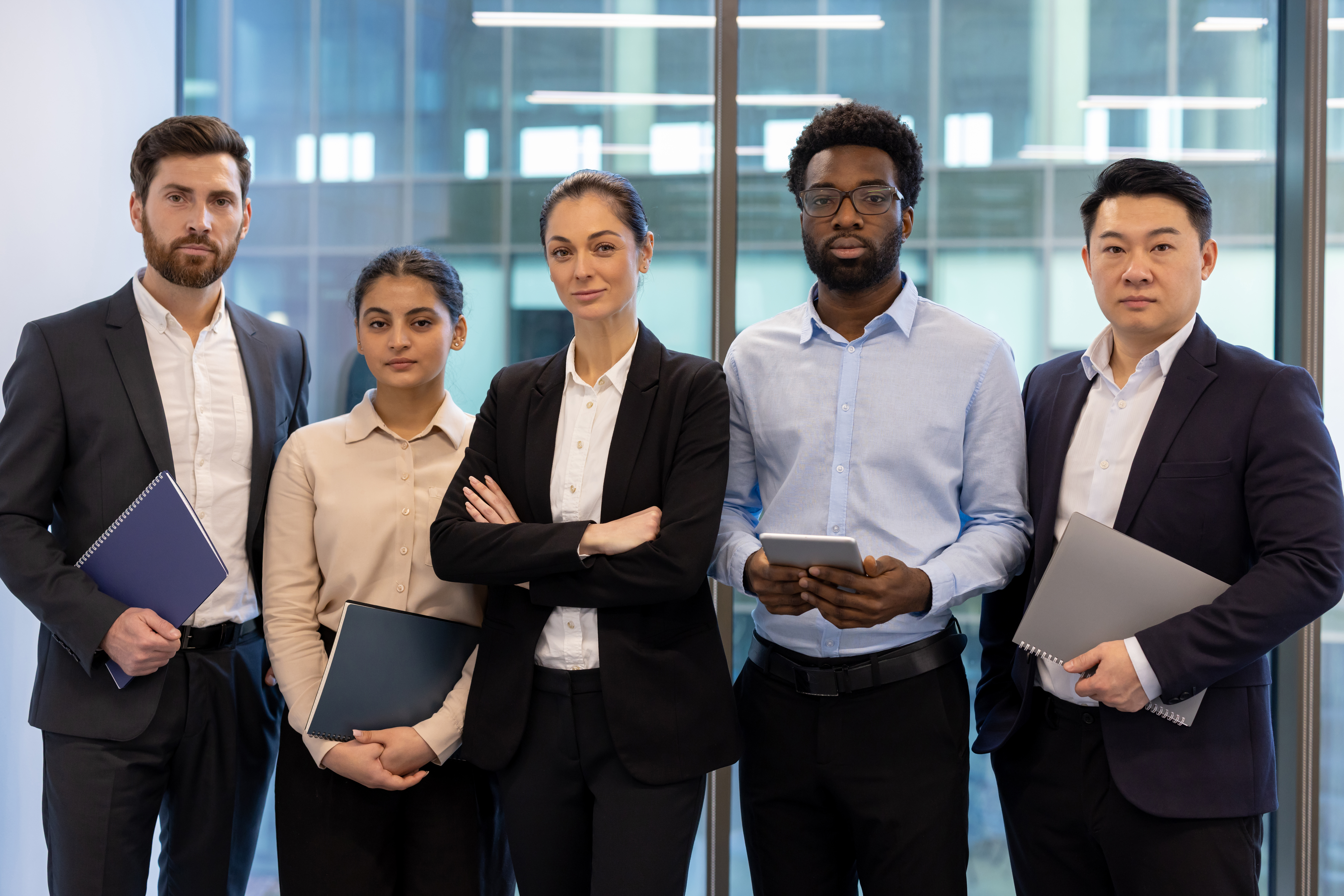 a diverse business team stands together ready for b612d73071df1f479eb9