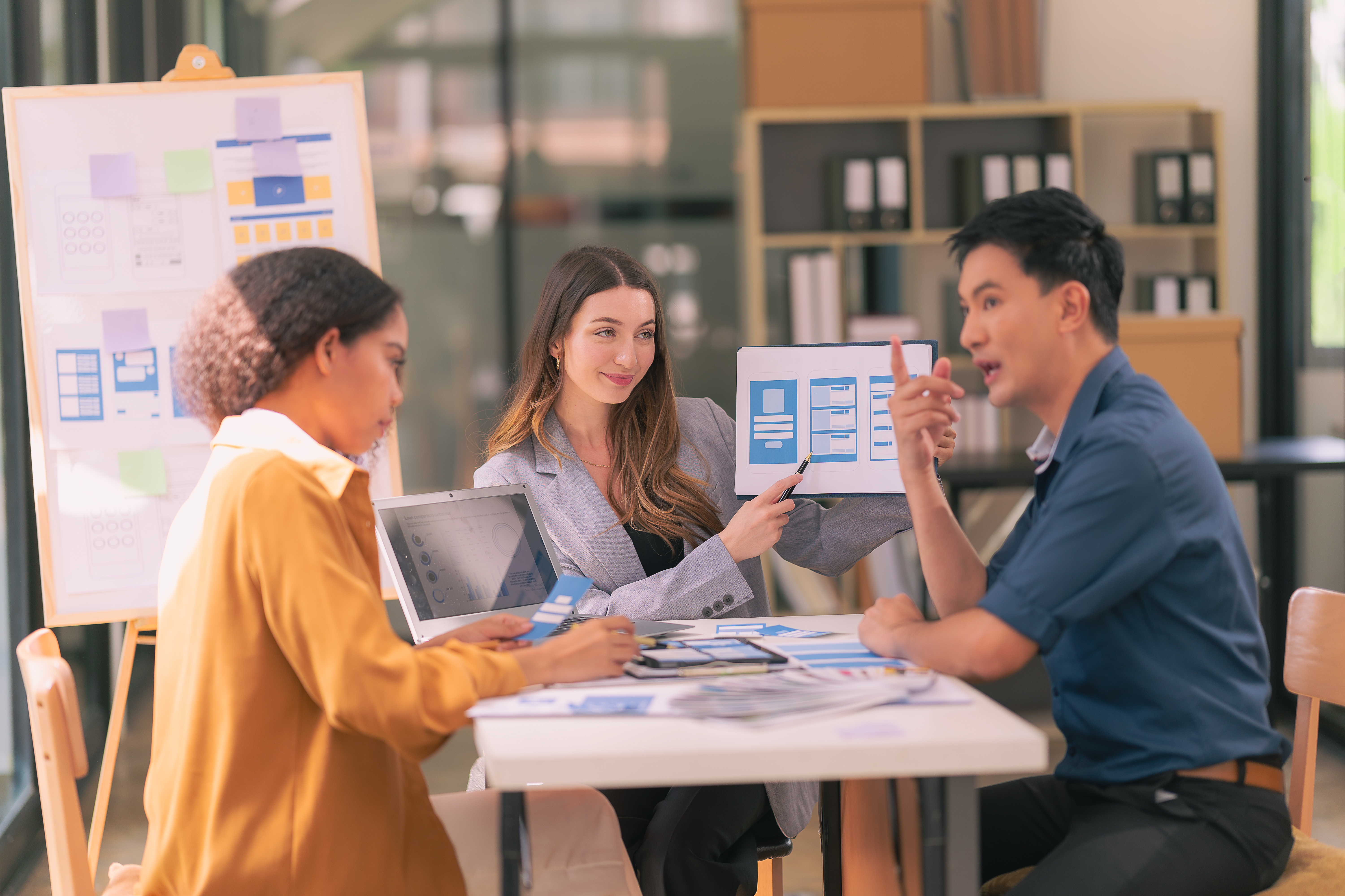 Boost Your SEO by Enhancing User Experience: A Blueprint for Success 28 a group of businessmen discussing investment and b e64ced03a18ac39343b9