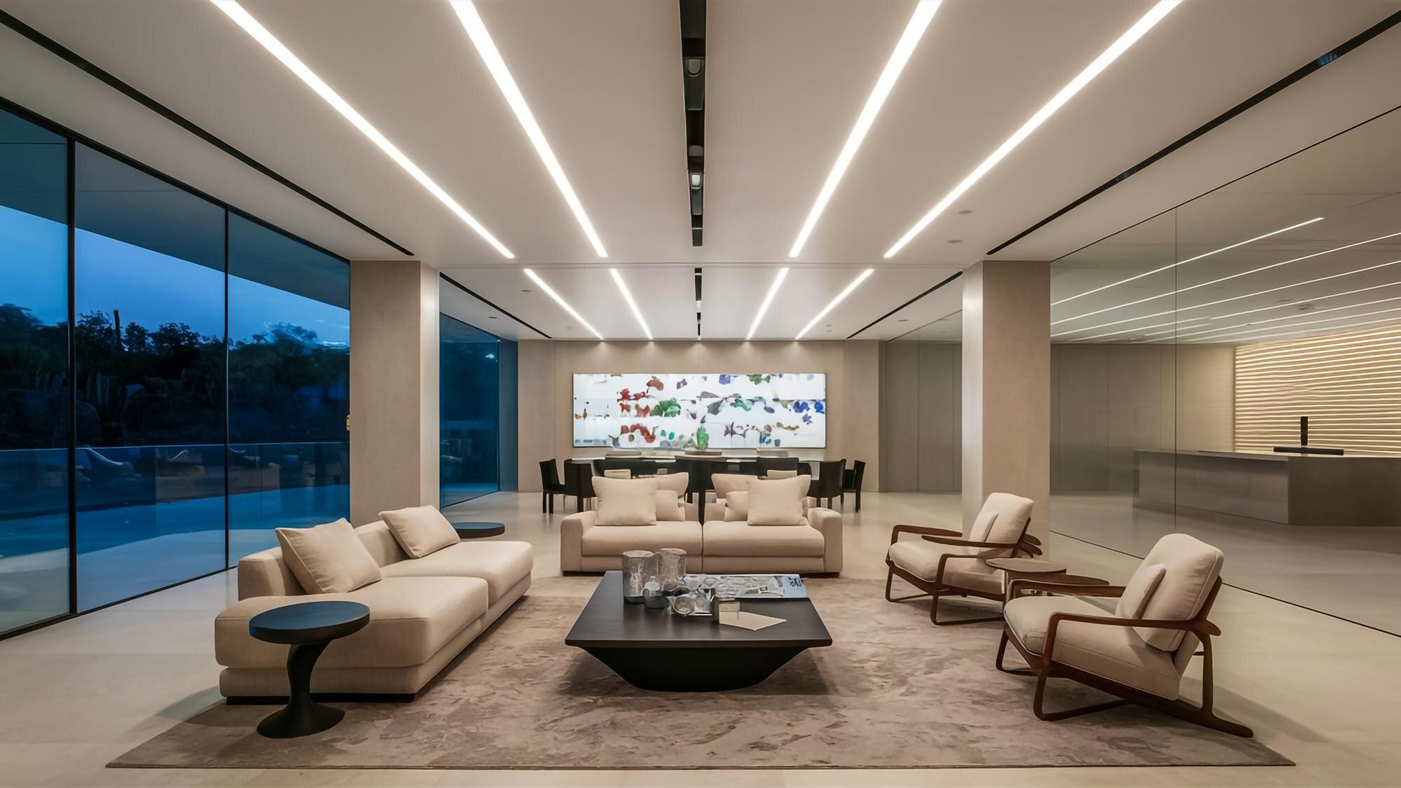 a room with a large wall of windows and a large sc 3fedaf0ffd47fdf63aed