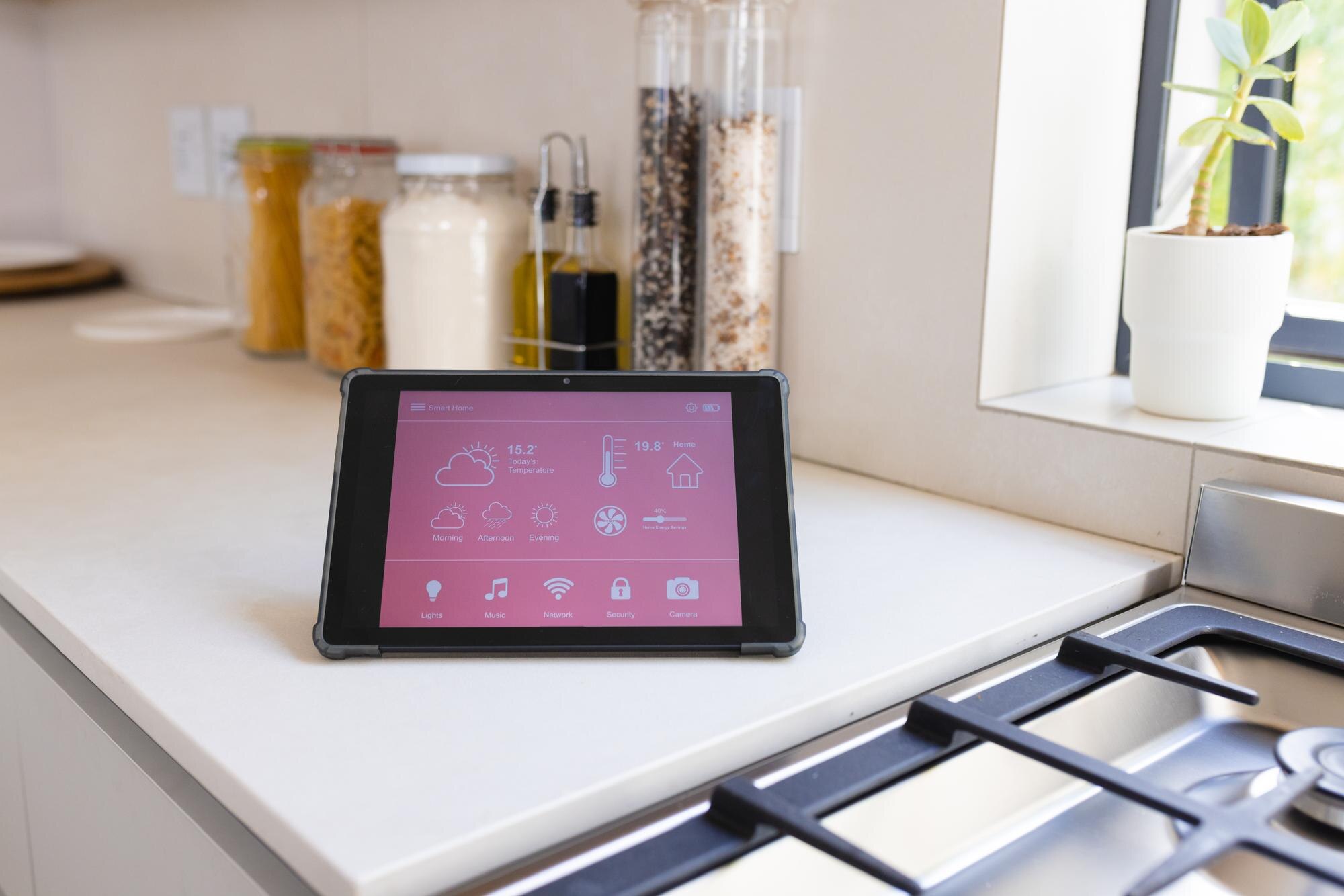 A Tablet Displaying Smart Home Interface Rests On 1391186f3fdda160b26e