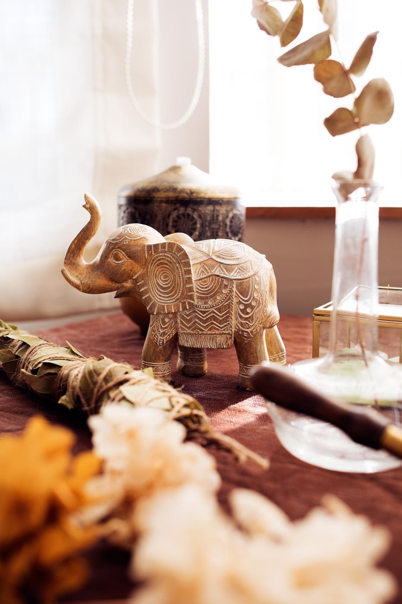 a wooden elephant figure on a witch s altar with d d32829f8f8a2fe1166a8