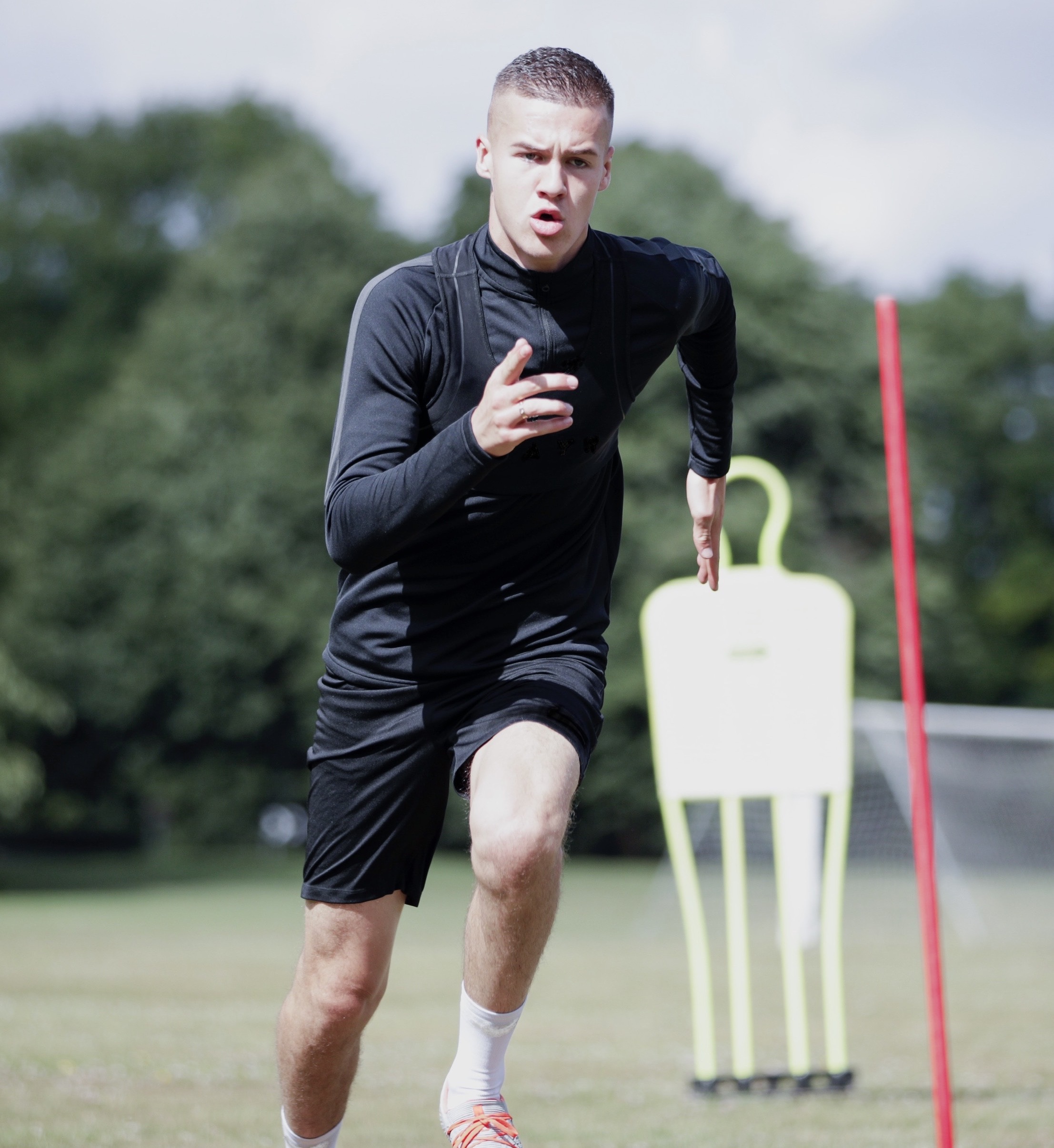 A Young Man Football Training E6dc074b1dfaa59ee8db