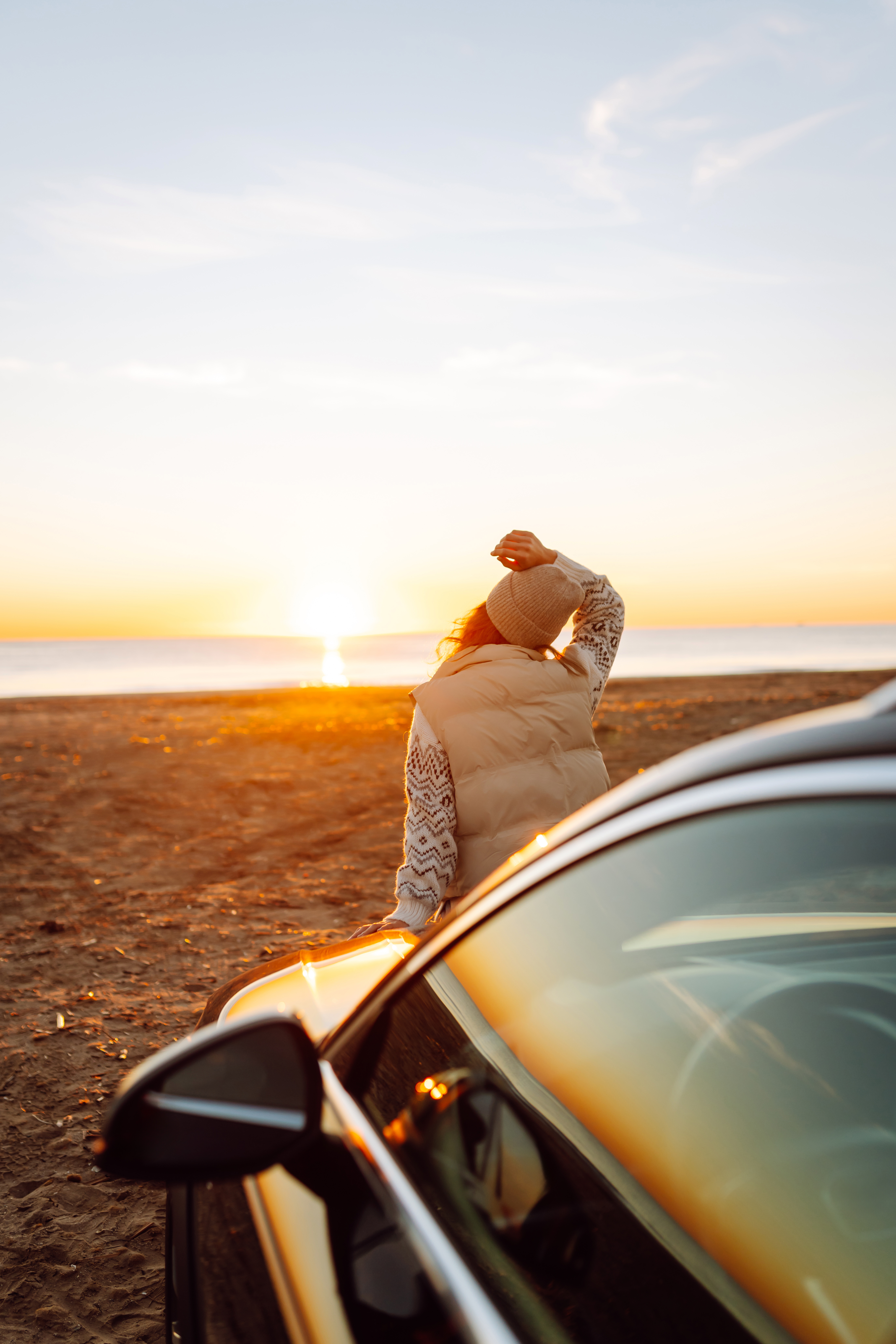 Plan Your Ideal Self‑Drive Tour: Expert Structure, Joyful Detours 4 a young woman on a road trip stands next to a car 1978c582c6a1e205881a BTOURS