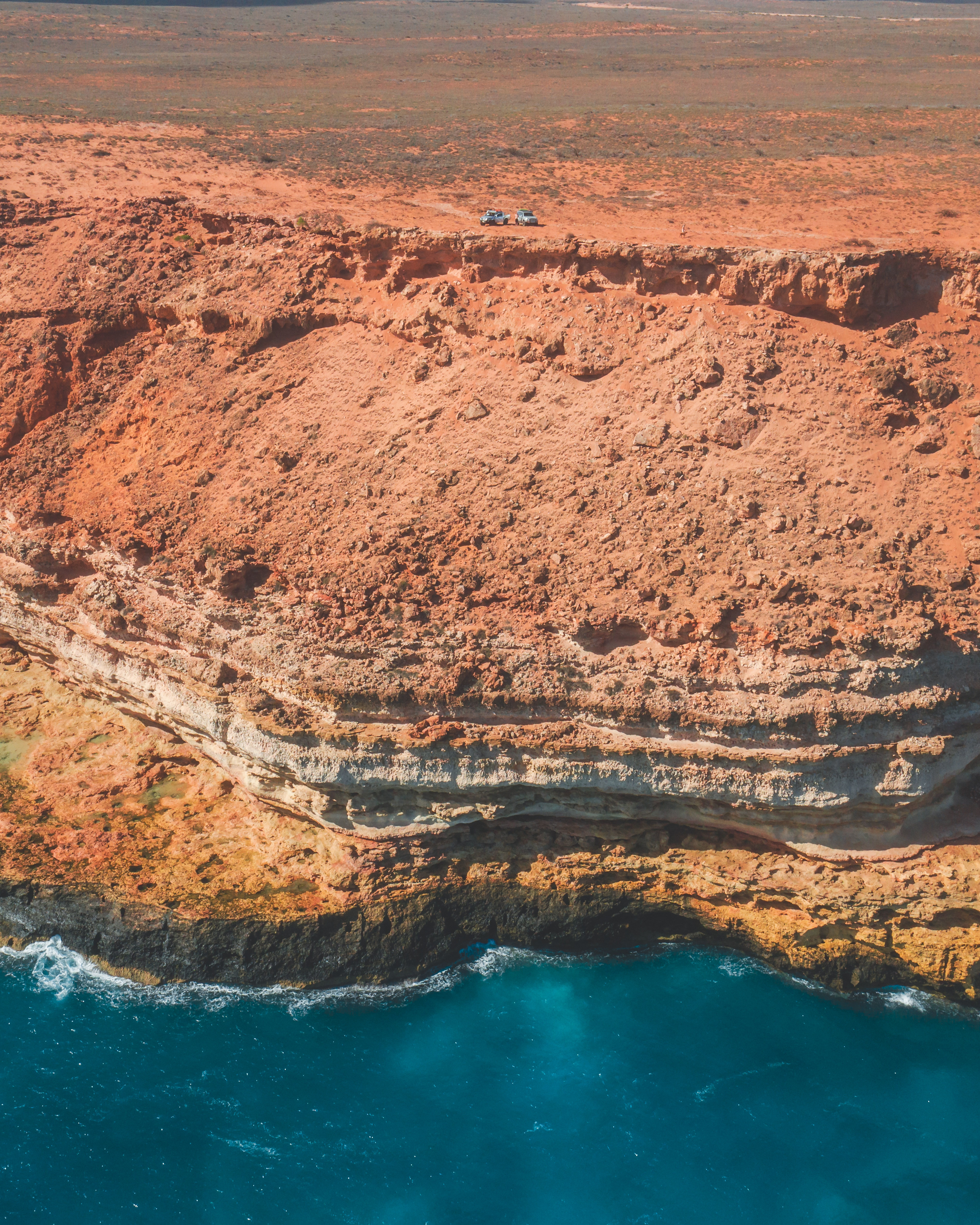 aerial view of a rugged coastal cliff with a blue ab4edd7ad4cea4d87e84 BTOURS