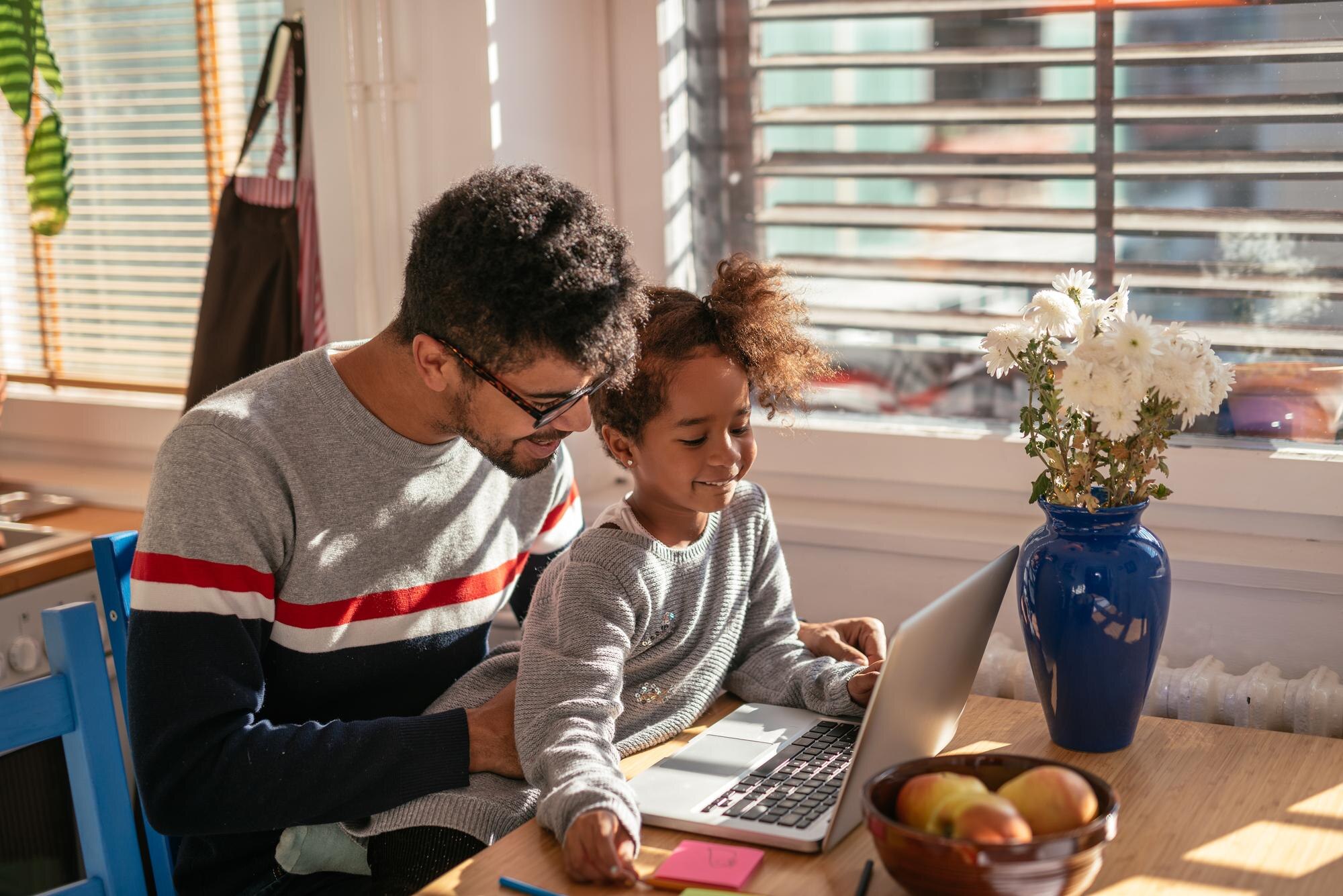 African American Father And Daughter Watching Some 7239d31ca321b7792a40