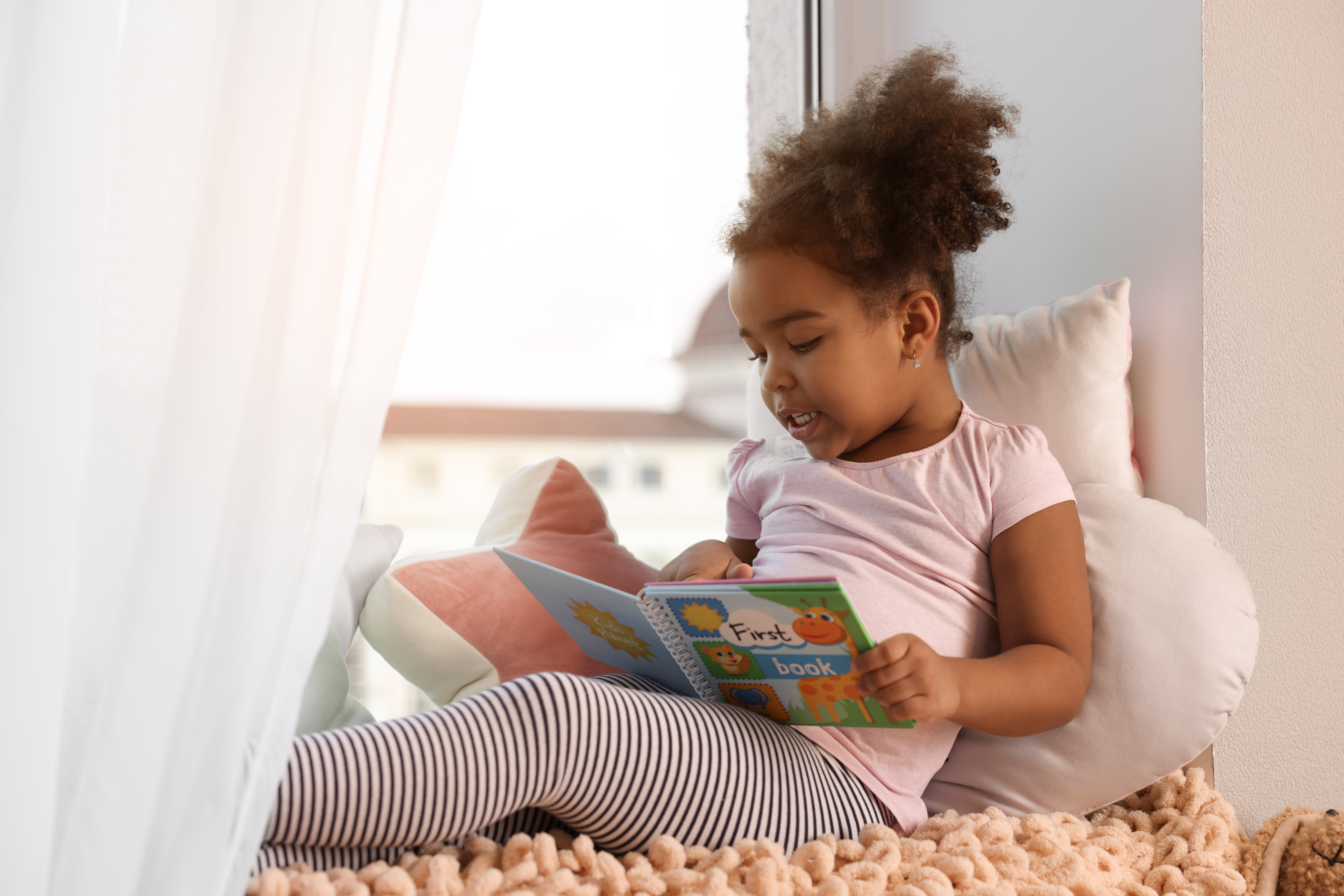 African American Girl Reading Book At Home 3373480b21208b6caabc