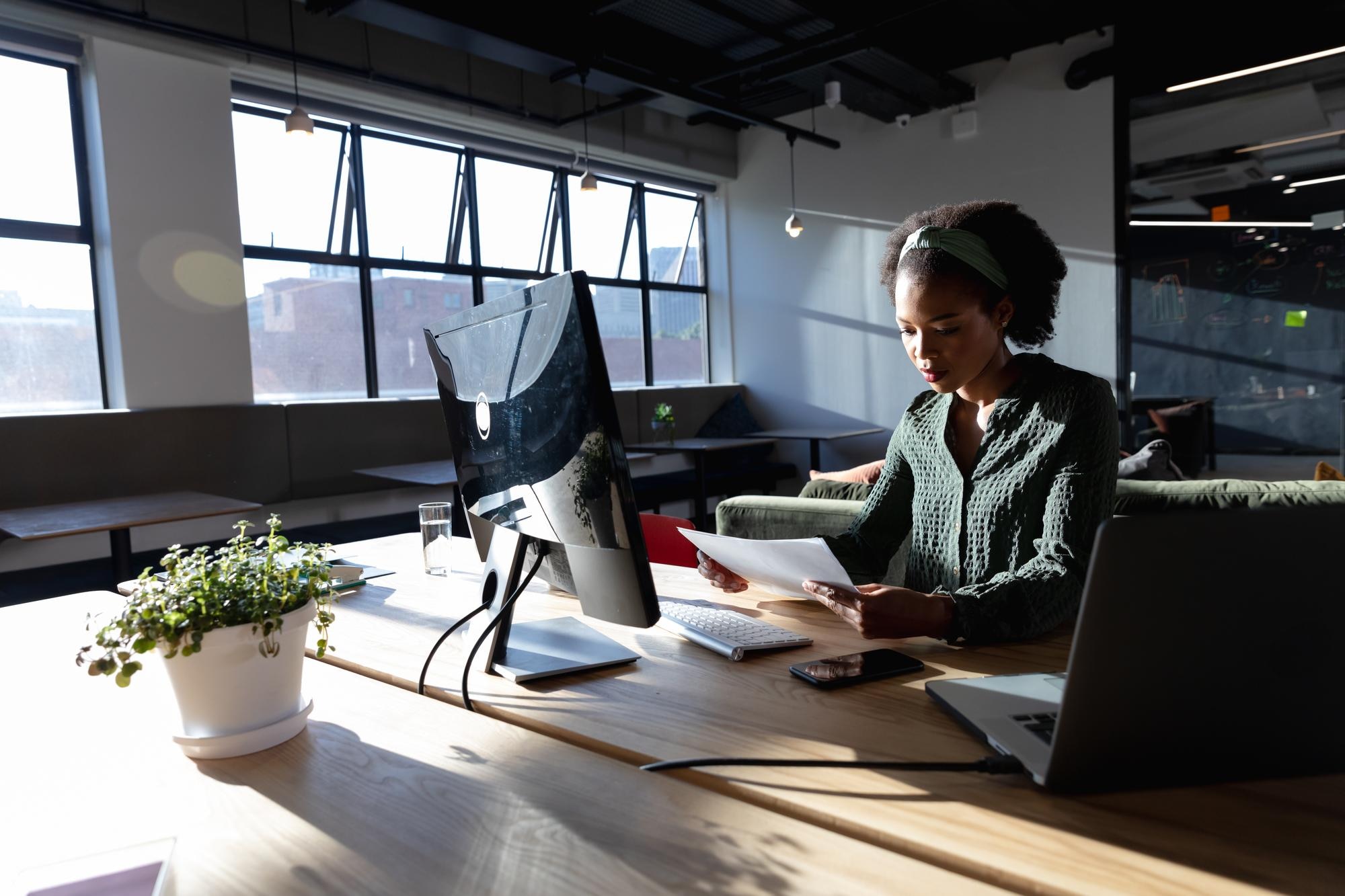 Crafting Realistic Self-Care Routines: A Guide For The Busy Professional 2 African American Young Businesswoman Examining Doc B240E919782951C964Ba