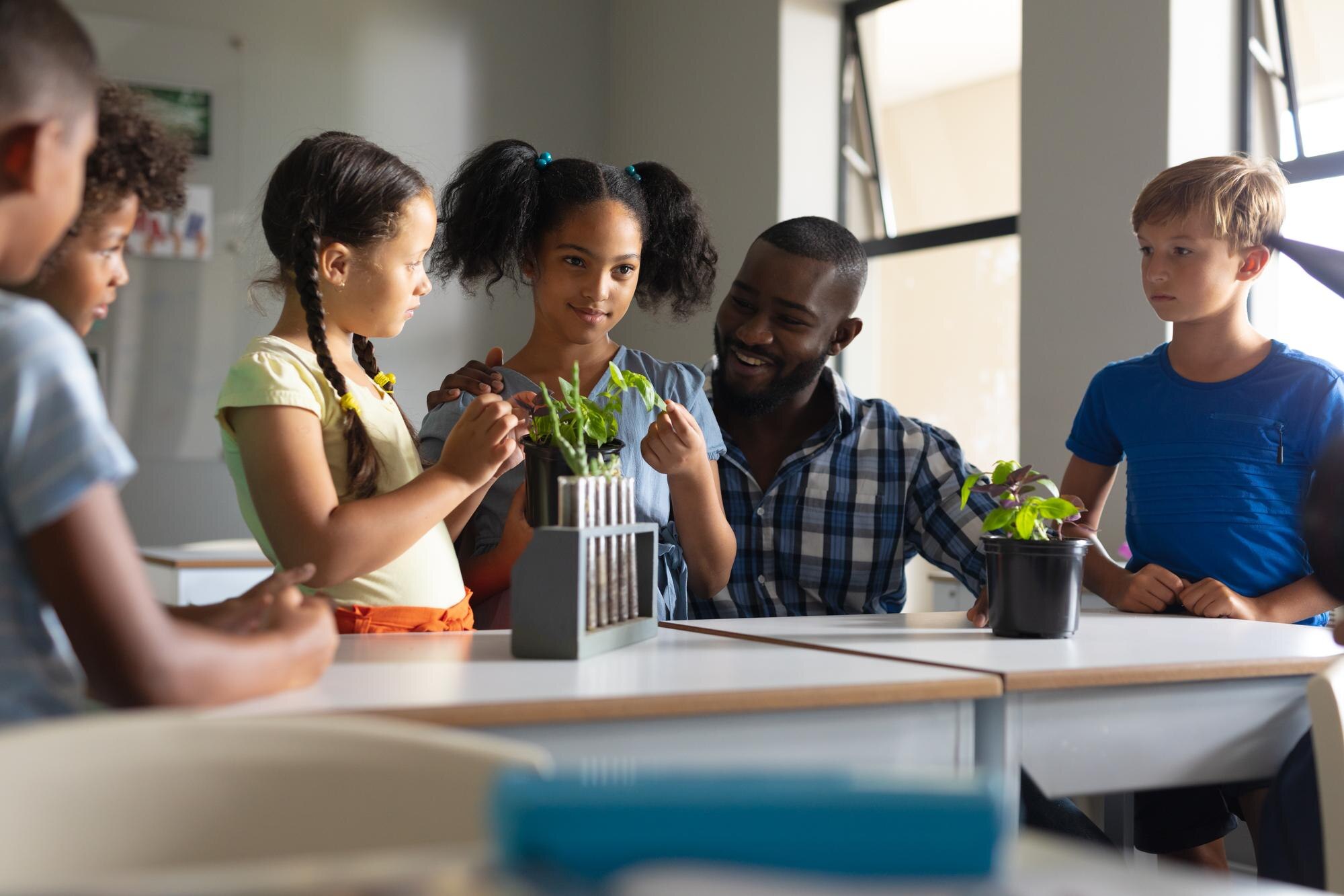 african american young male teacher teaching scien 2bd7740aded45f64505d