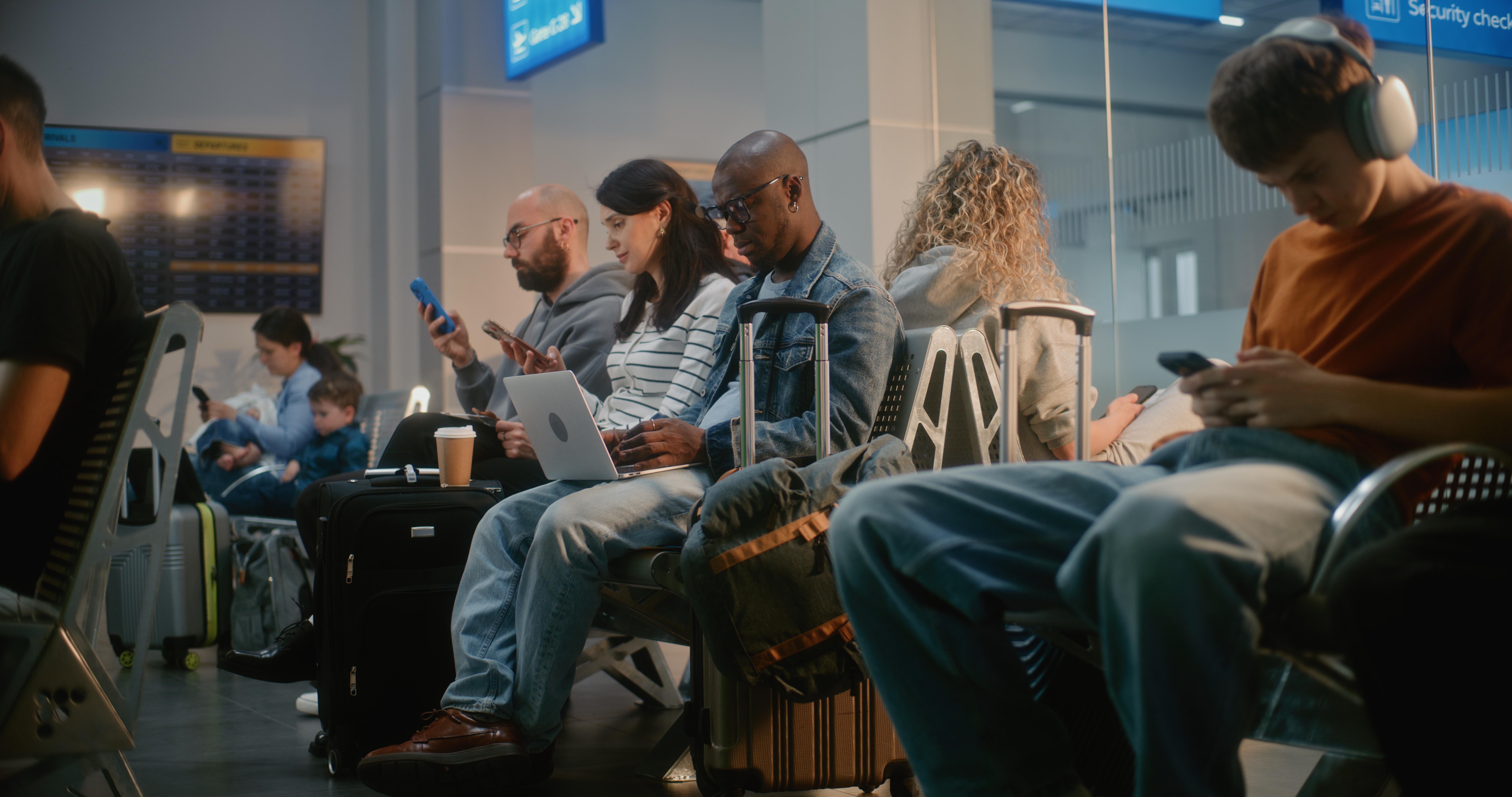 airport terminal diverse people sitting and waiti 6ae036db1926faf2505d