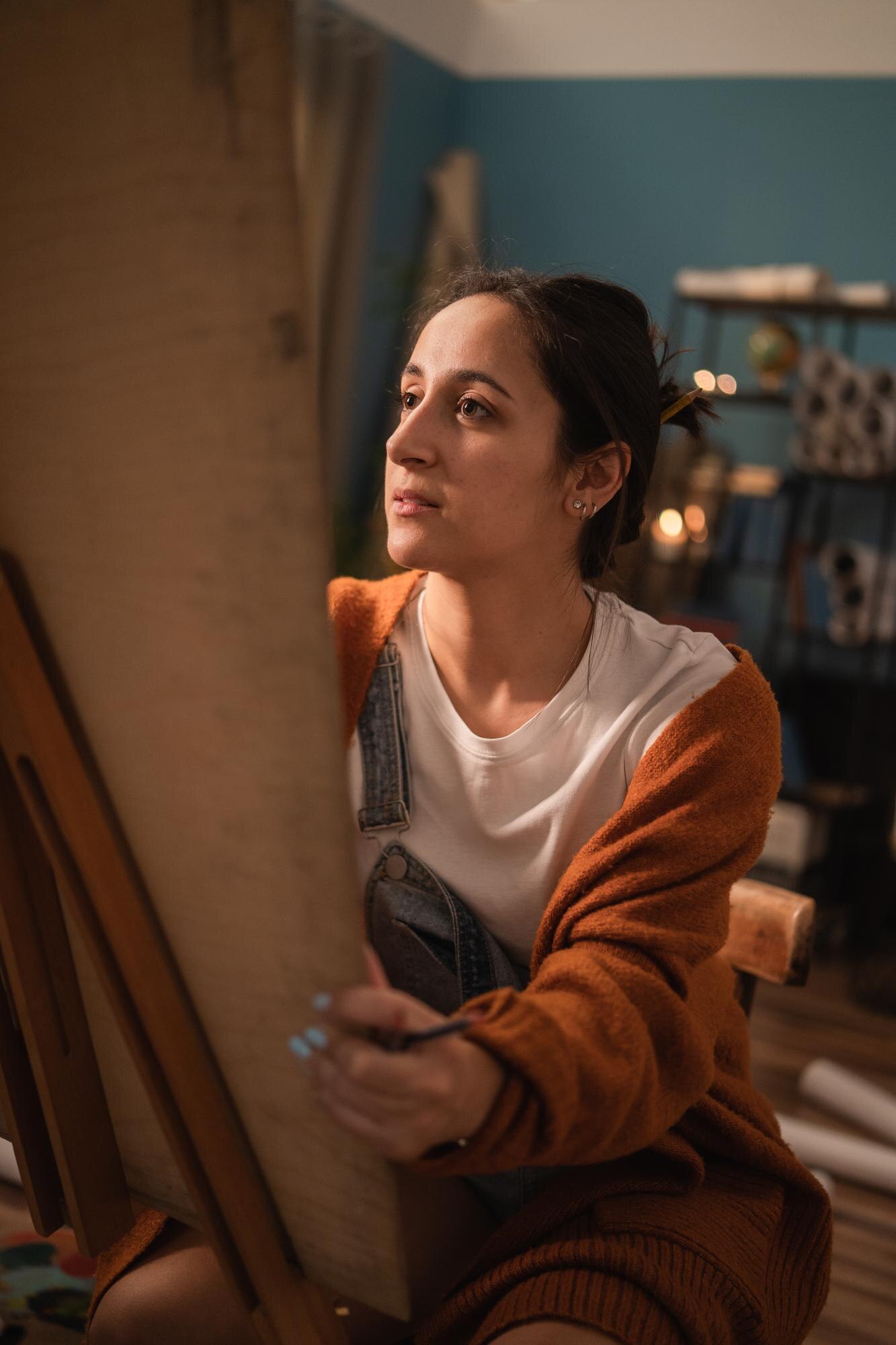 An Art Student Sits At Home In A Remote Class And 9f4992e45d18cd8e4a86