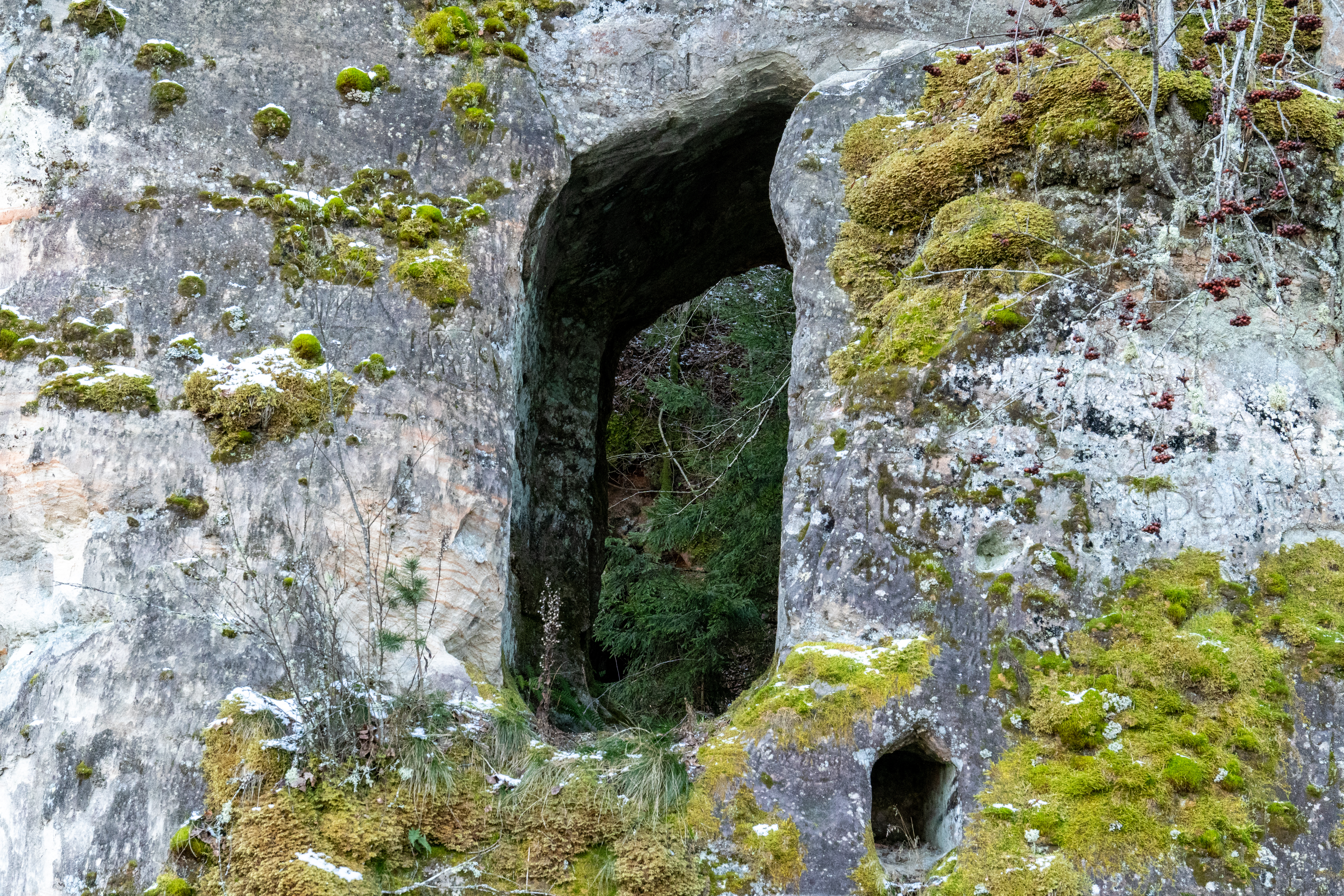 ancient sandstone archway covered in moss in a for 39ac5279cfc94d4bad56 BTOURS