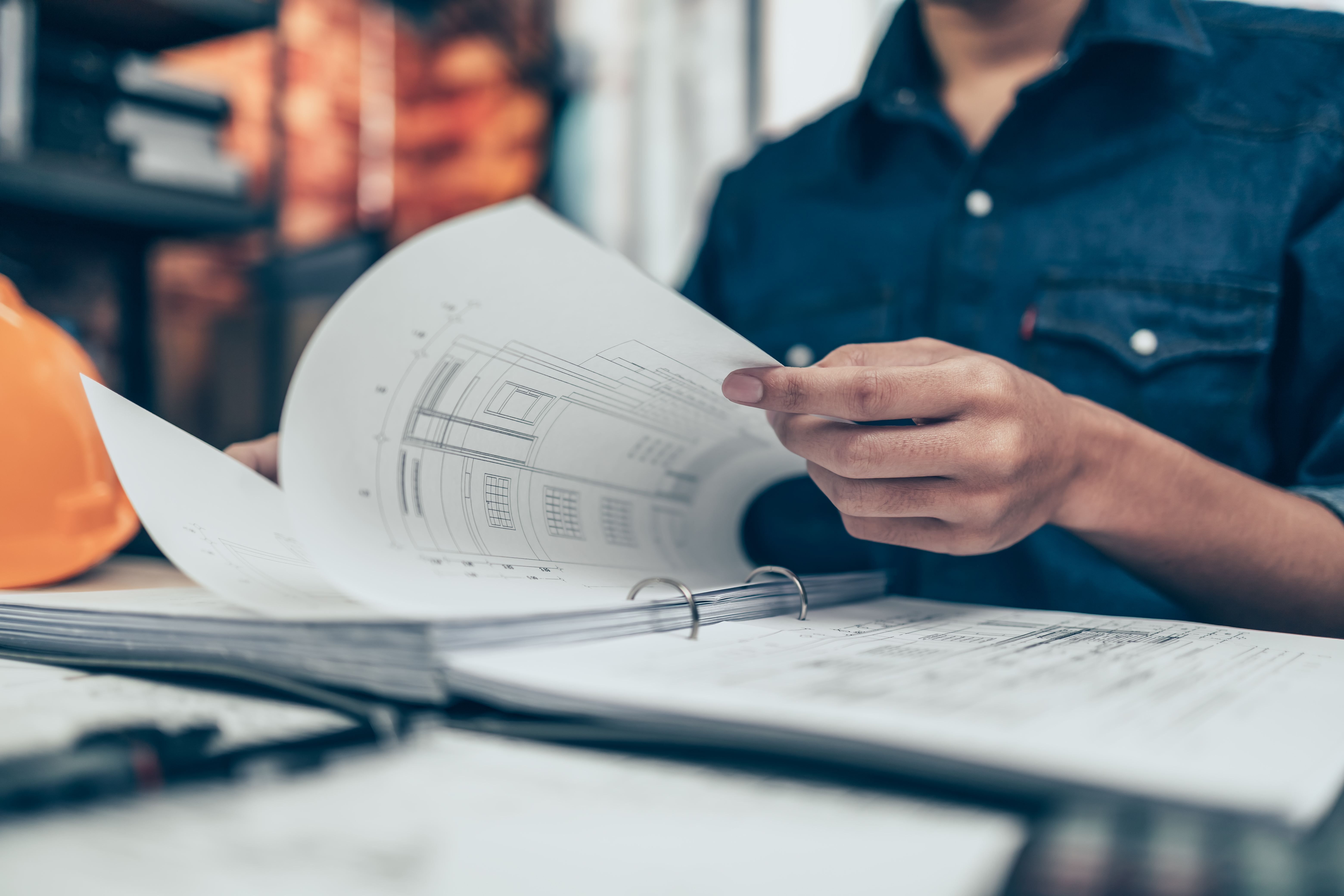 architect engineer read drawing design working on 1e99a2b29b89a8d4e544