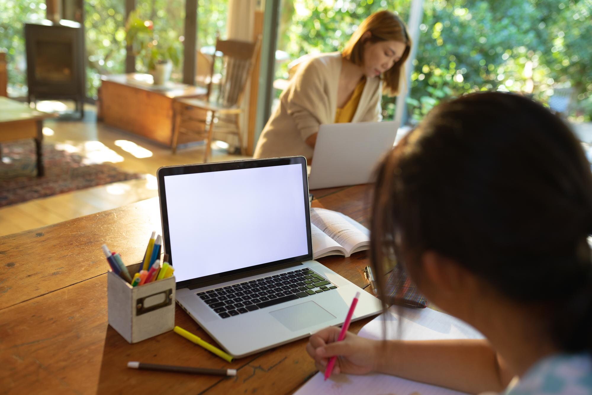 How to Choose a Flexible, Accredited K-12 Virtual School in 2026: A Parent’s Checklist Asian Girl Using Laptop With Blank Screen Writing 87ce6b23d5a3308d8696