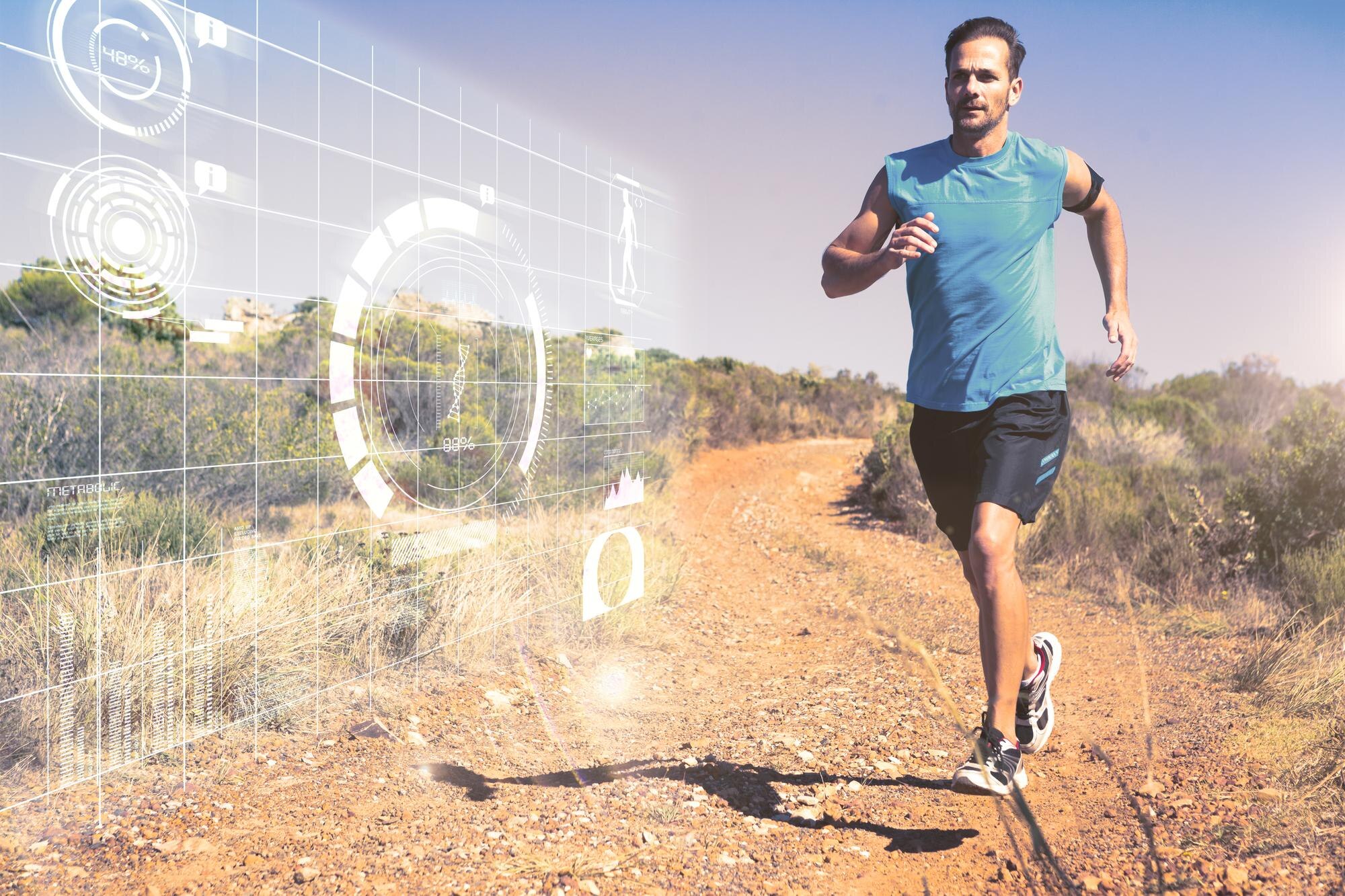 Athletic man building stamina on a scenic country trail run at sunset