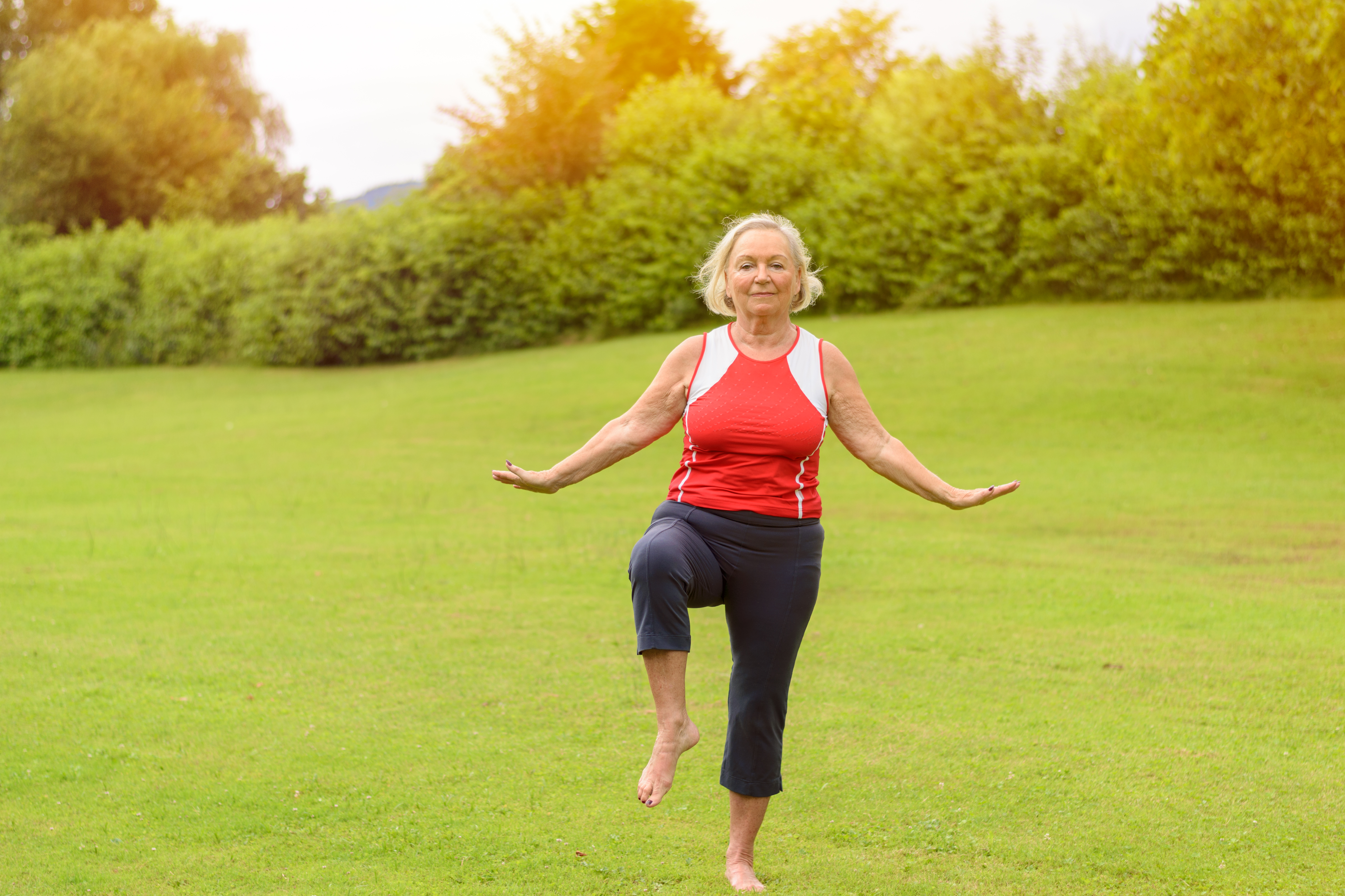 athletic senior woman performing balance exercises 31425f7702e1333789f9