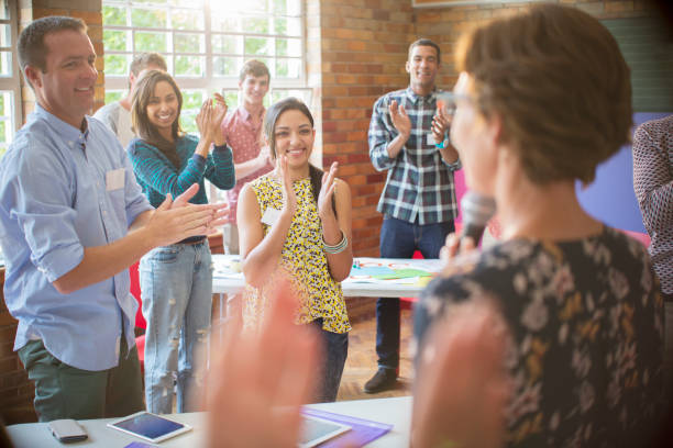 audience clapping for speaker 249933c0a88406735777
