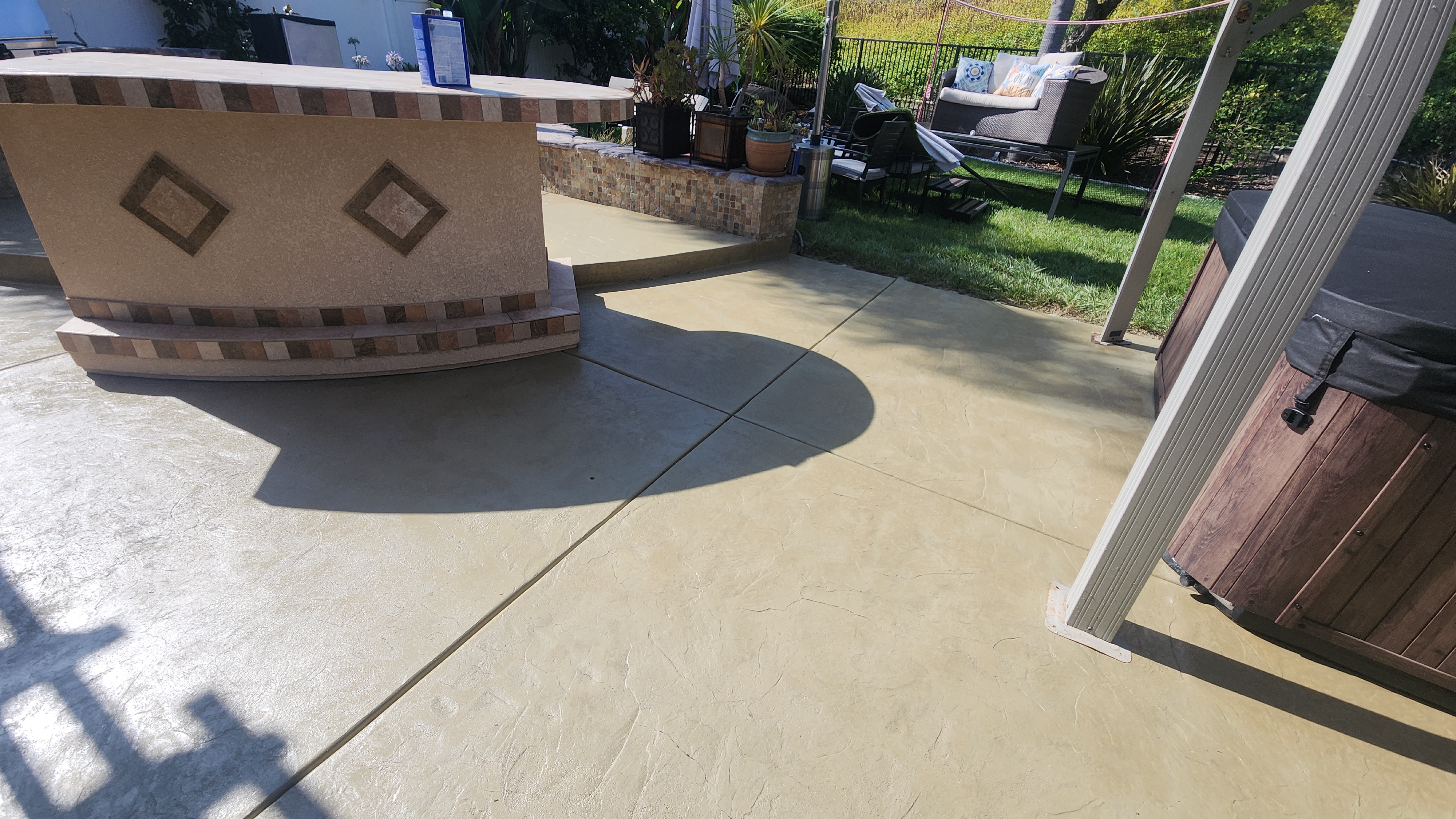 Summer-proofing concrete installation and paver care for San Diego homeowners