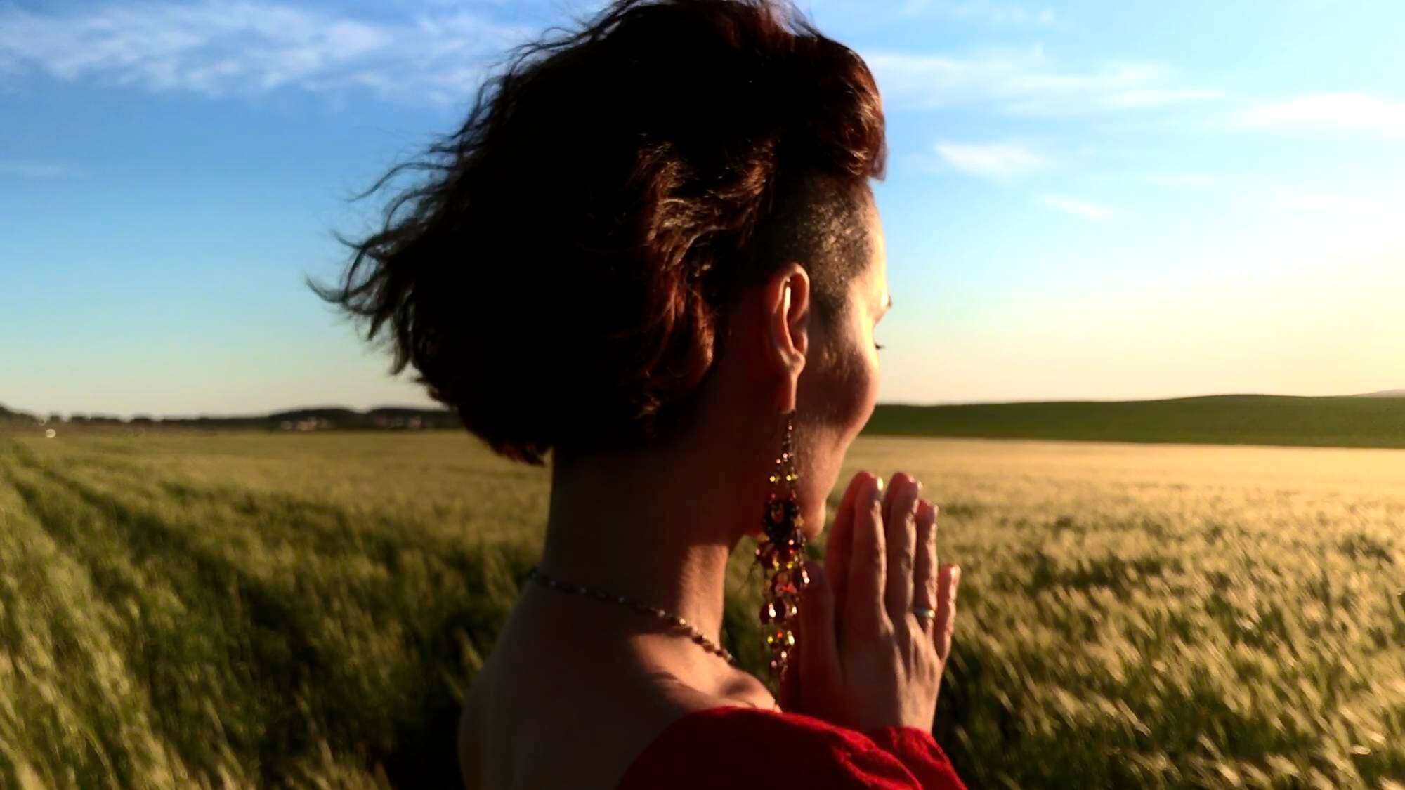 believing woman with her eyes closed asking for fo 60f1ab478737d9035ca2