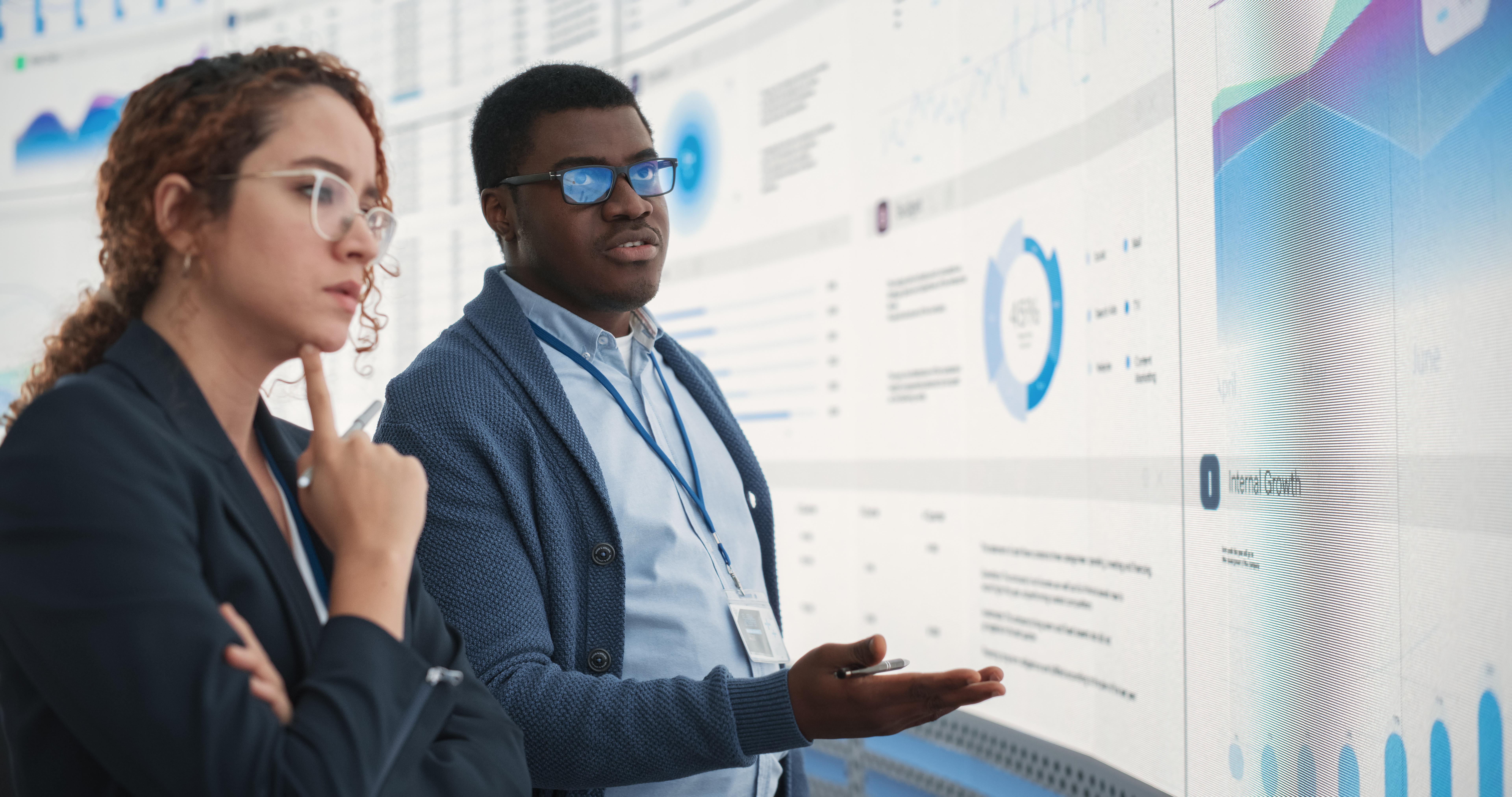 black man and hispanic woman working on business s 4617151b3db021c5ec27