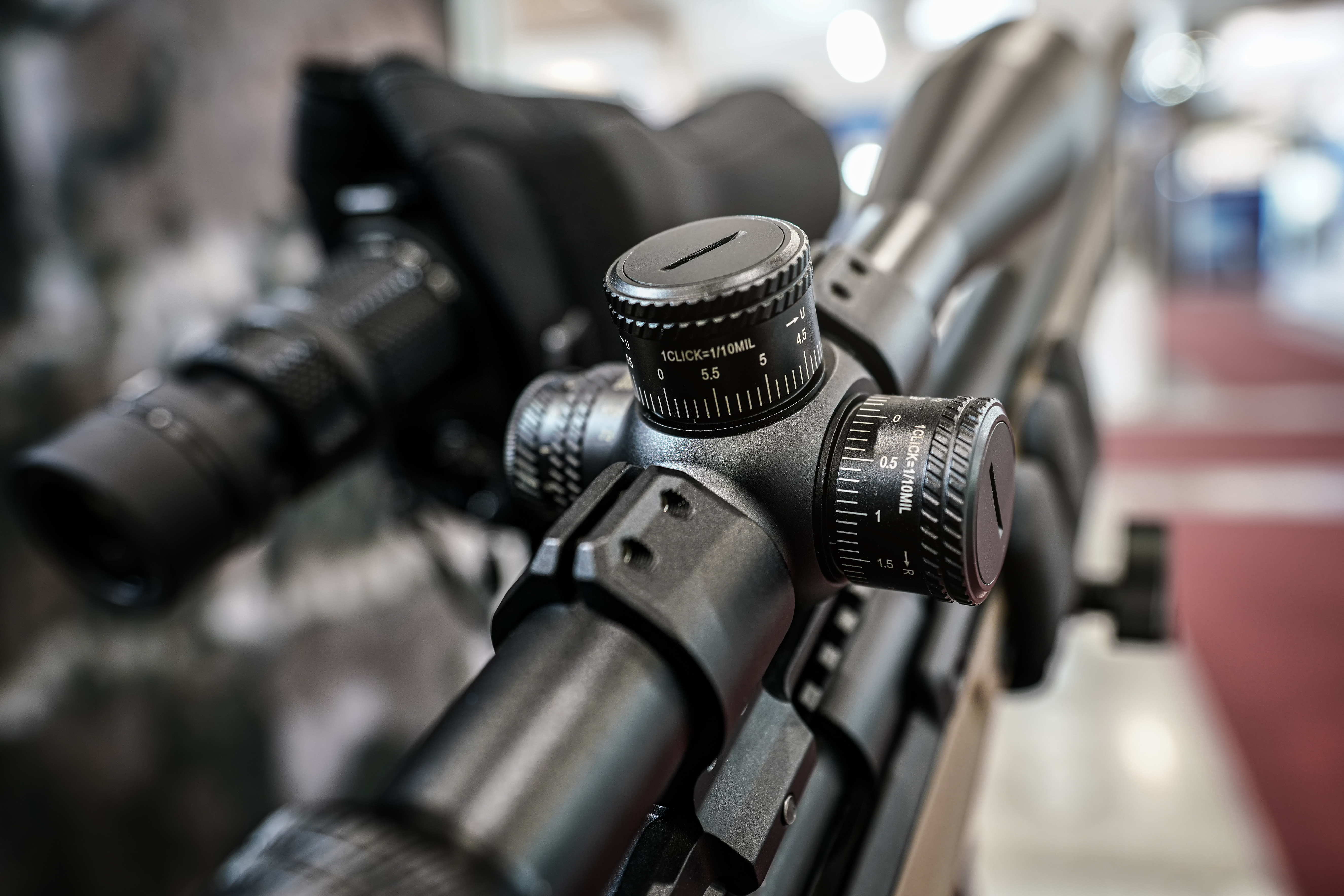 black shooting scope optics mounted on rifle displ fc250e1b71817f9b4502
