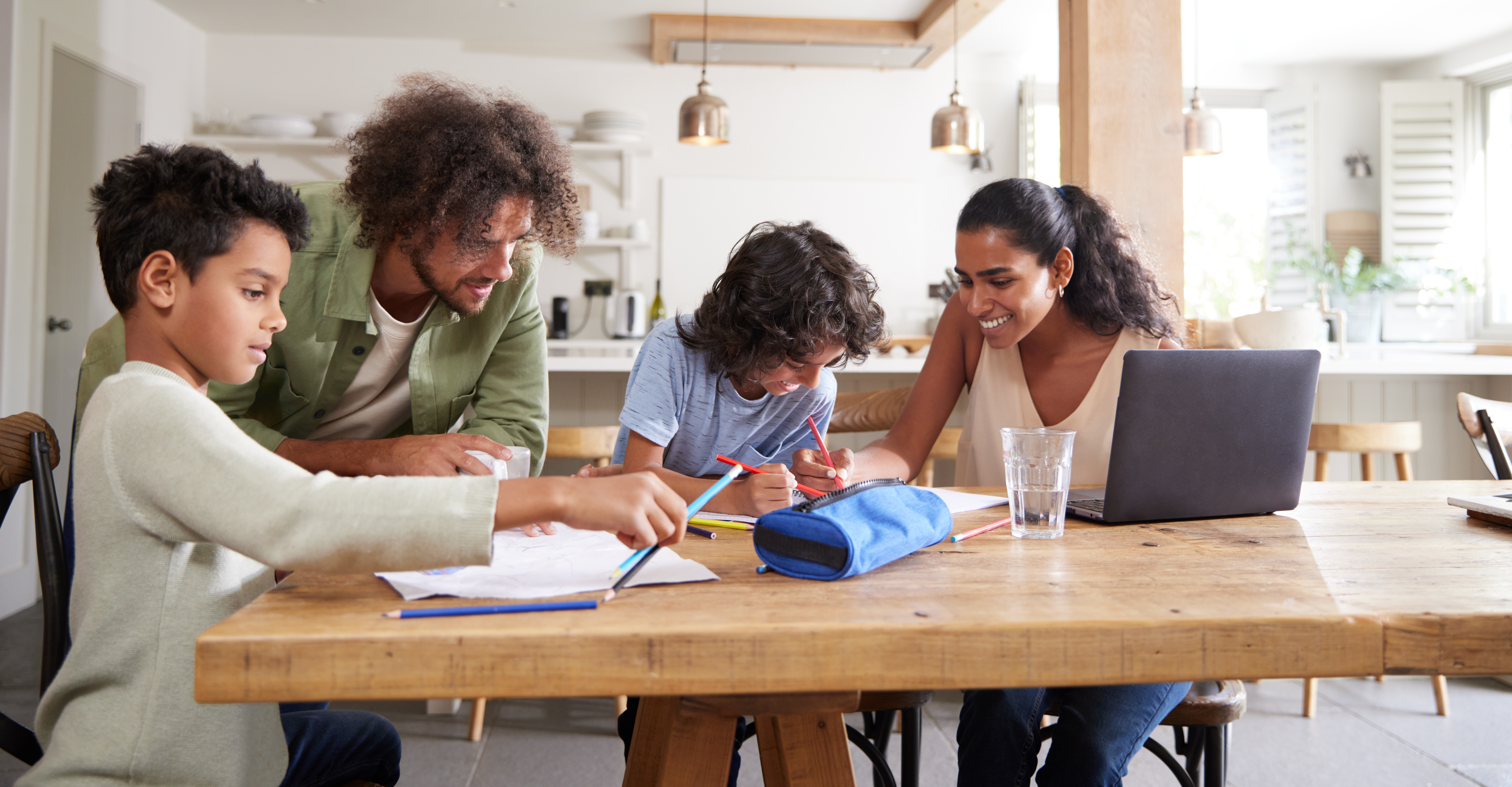 Boys Doing Homework With Parents Working From Home 44ddbd0862c4b5a4c54d