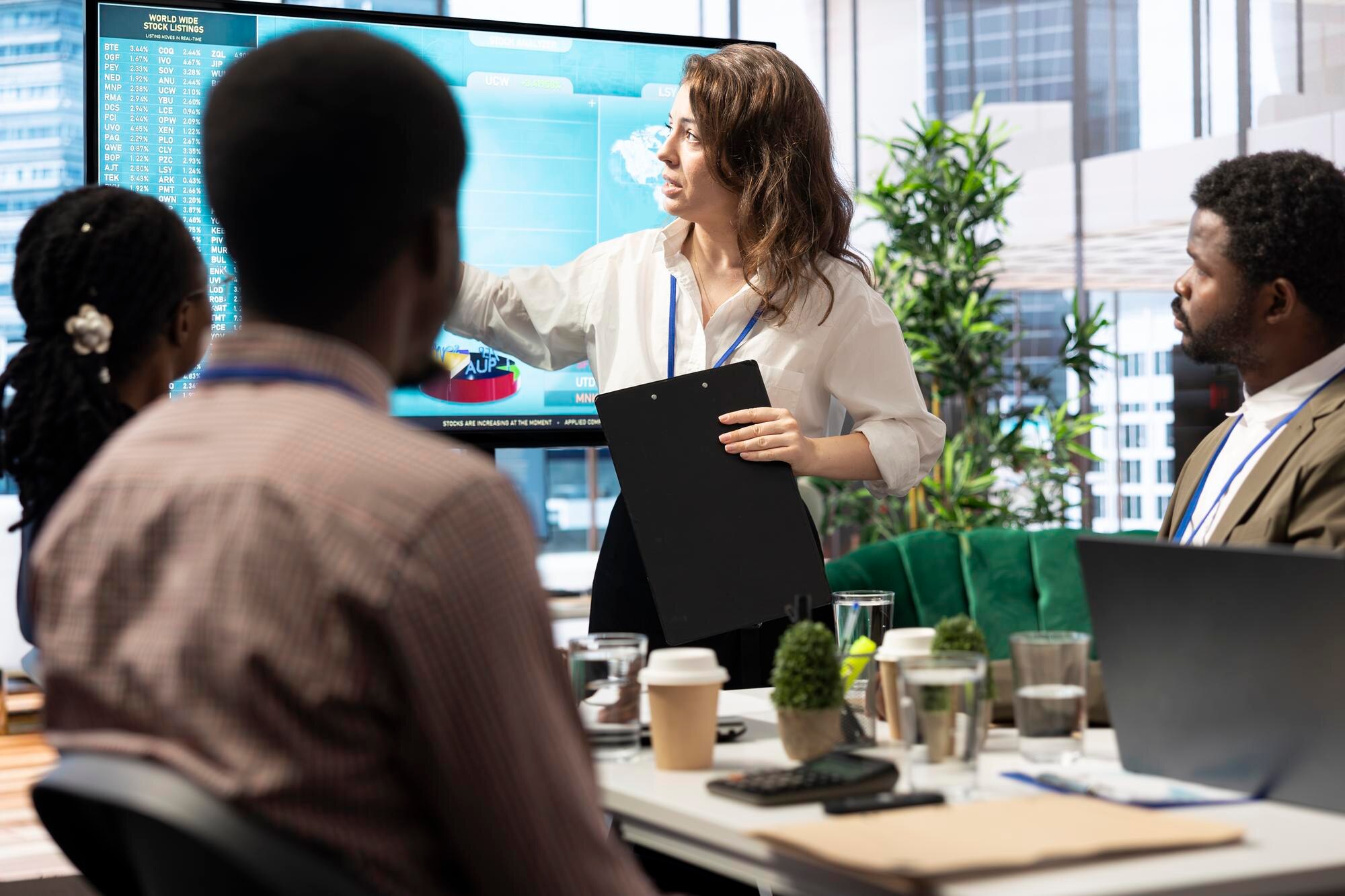 Cannabis Facts Your Workplace Can't Ignore: What You Need to Know 5 business associates reviewing key performance indi 80a1d61b273fd1246446