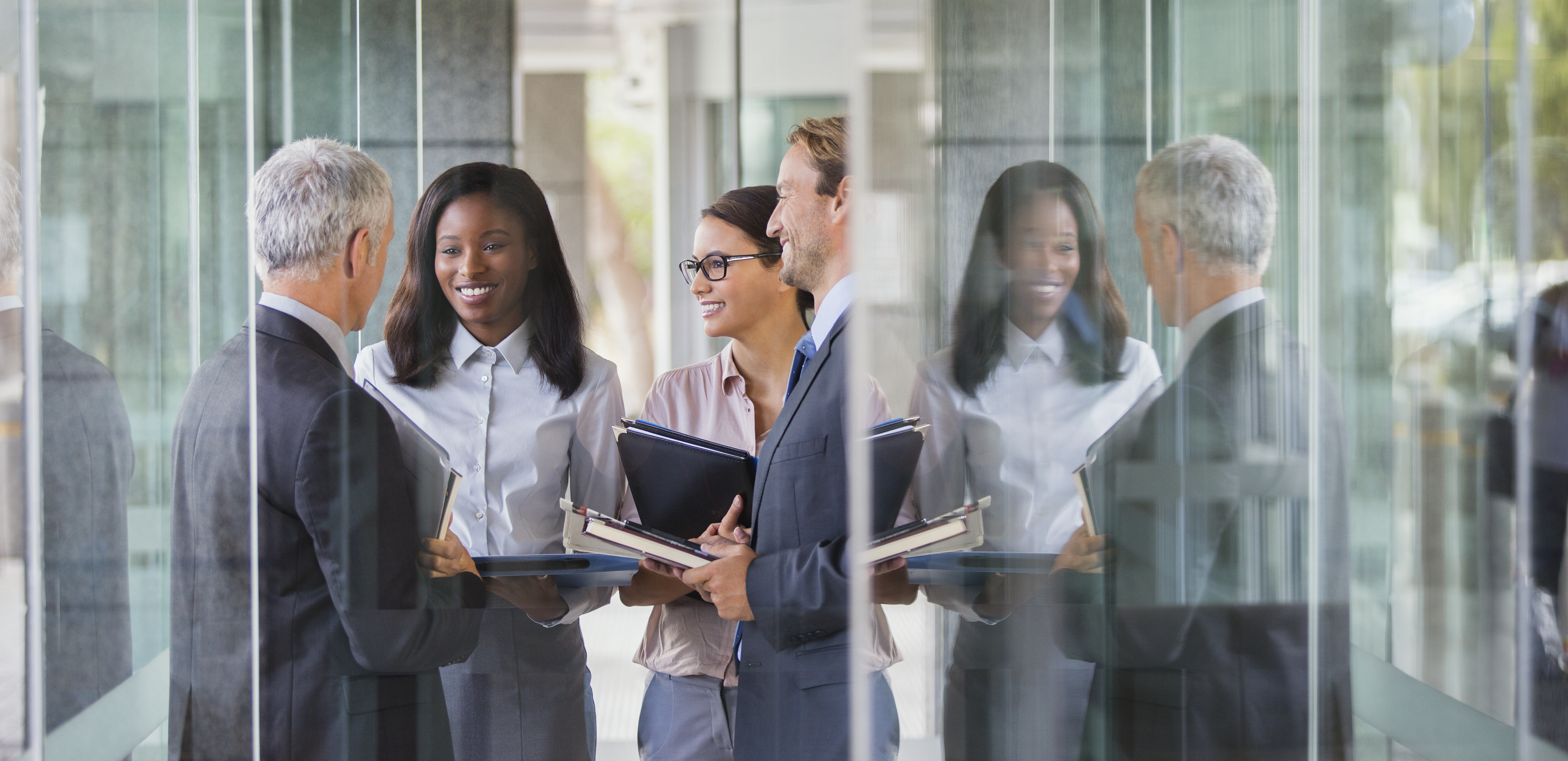 business people talking in office building 4768526a50b2dc3bedb3