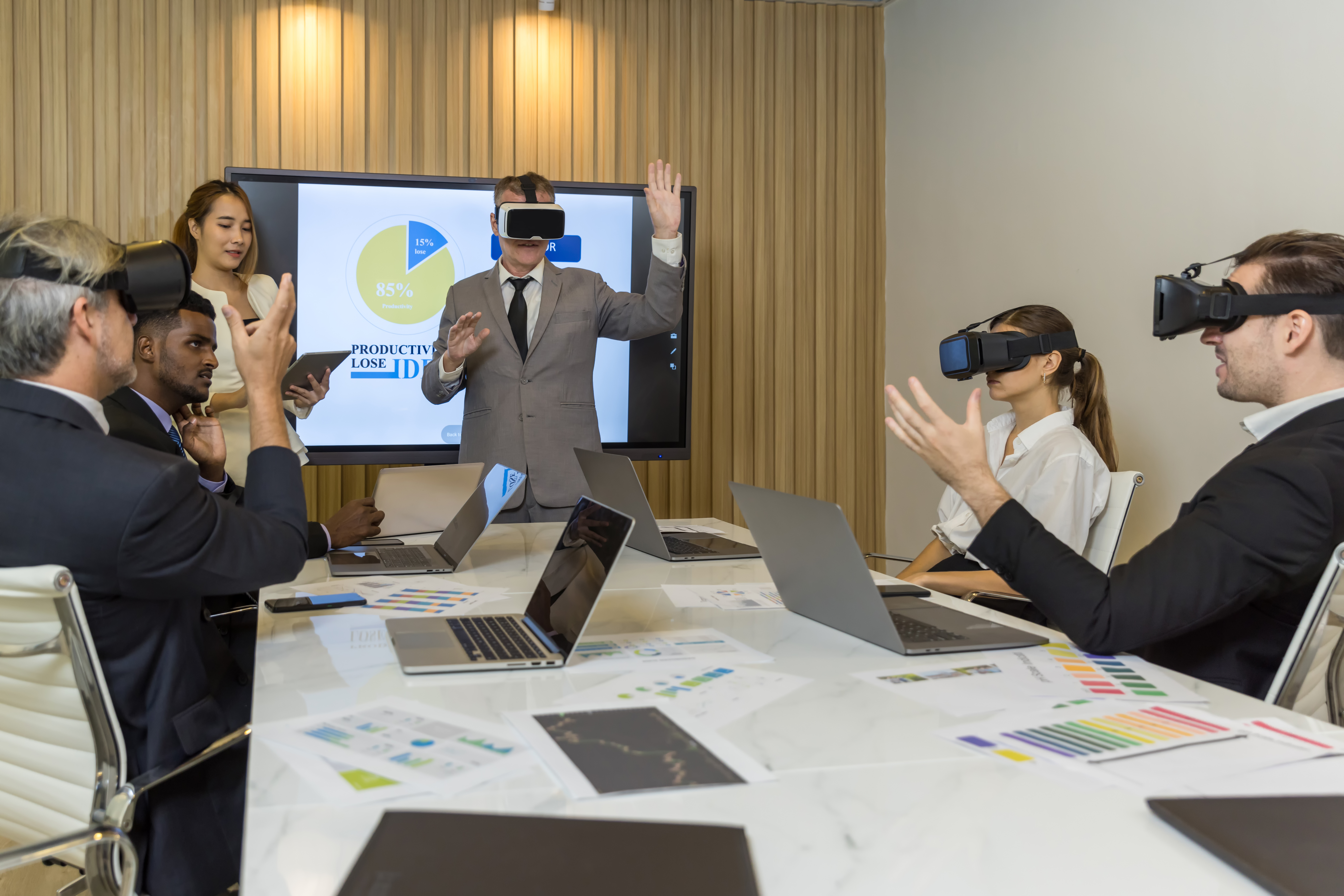 business persons with virtual reality headsets in a4cb8d264ca57b773b95