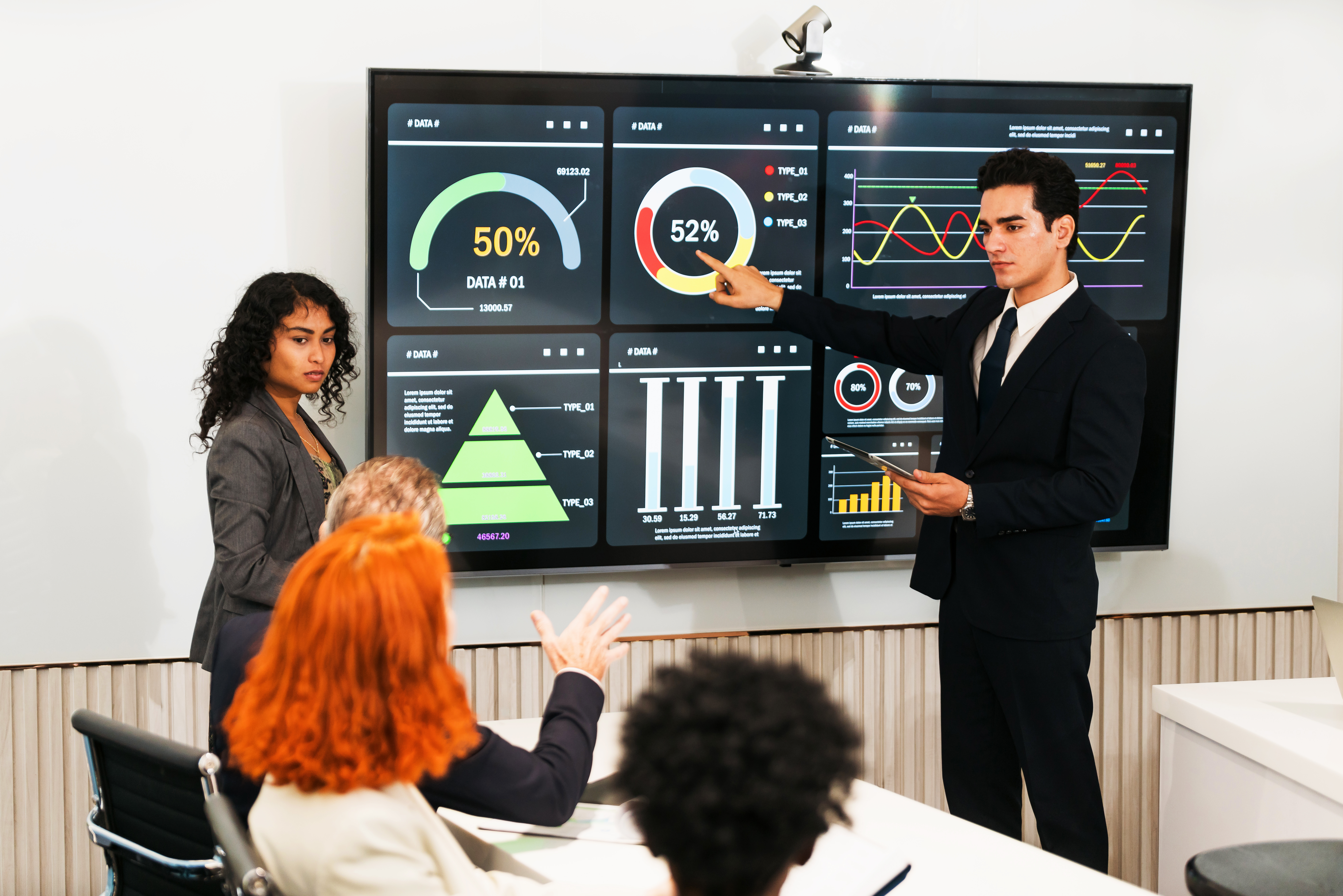 business team in conference room watches presenter 14eb50a3ffd541caab21