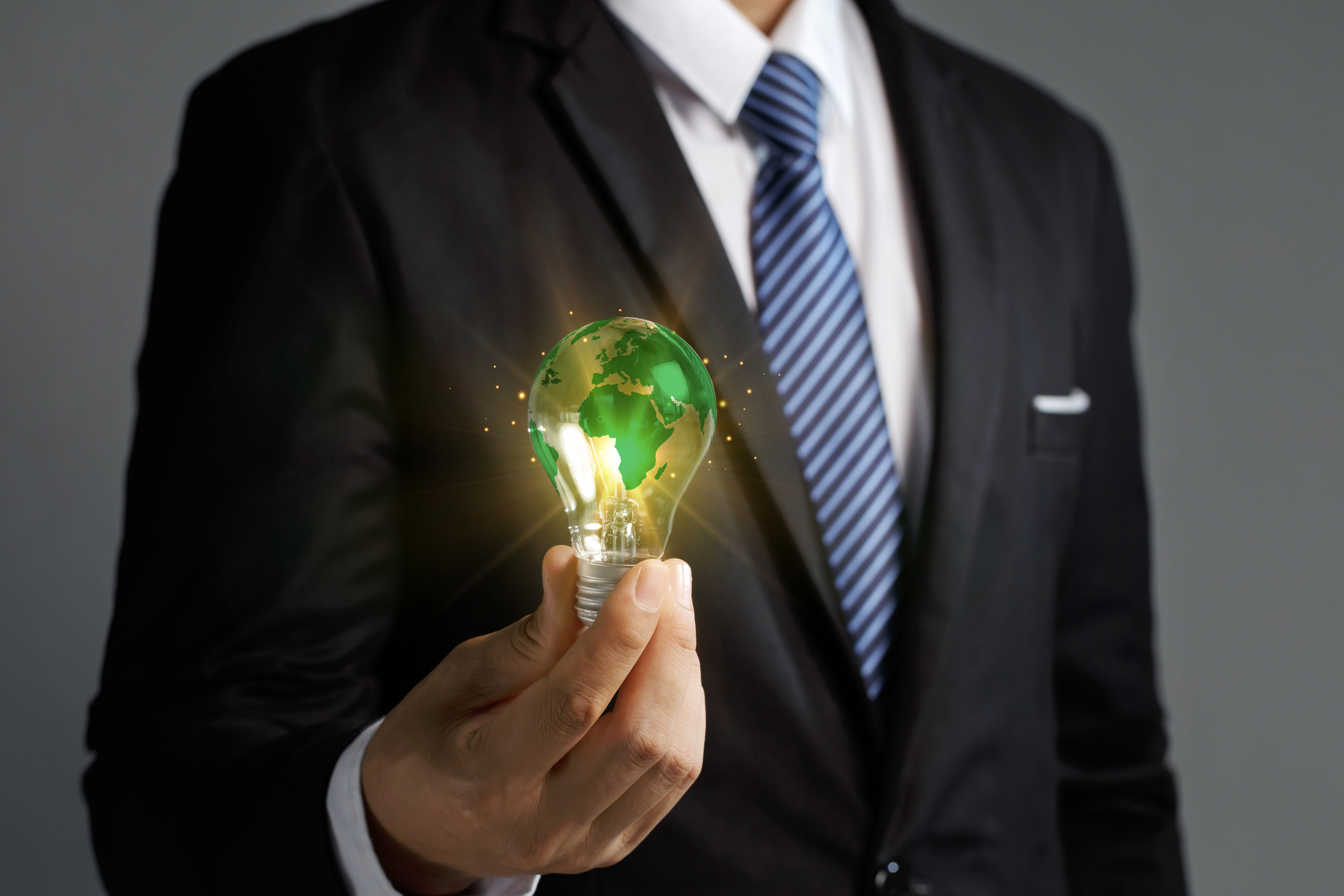 businessman holding illuminated lightbulb concept ac4f82427c3f302c14ed