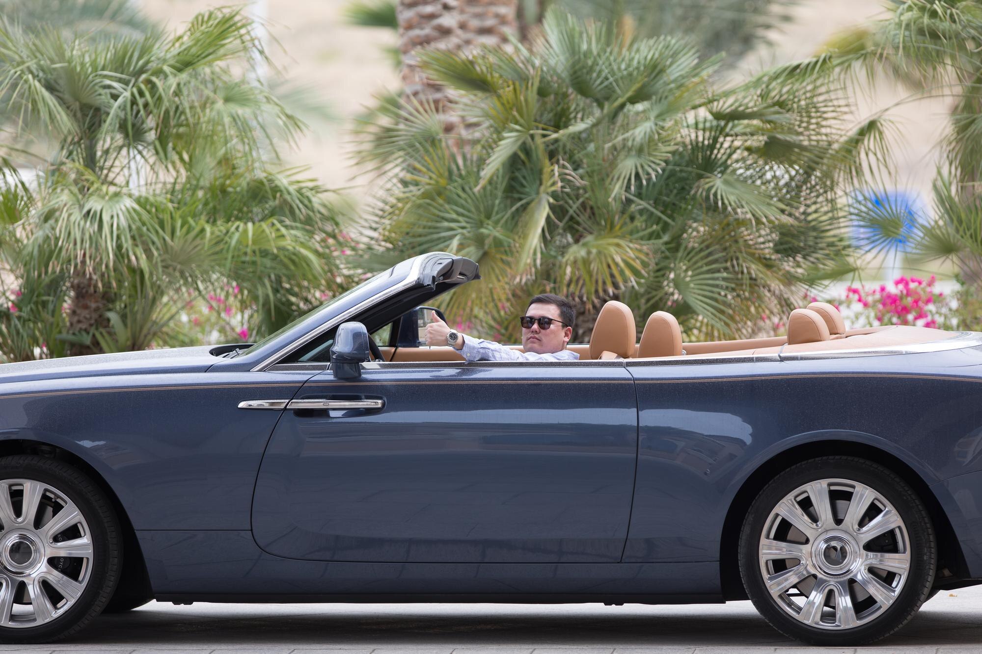 Car4Rent - businessman in the cabriolet ad217d8e70bb144eb01b