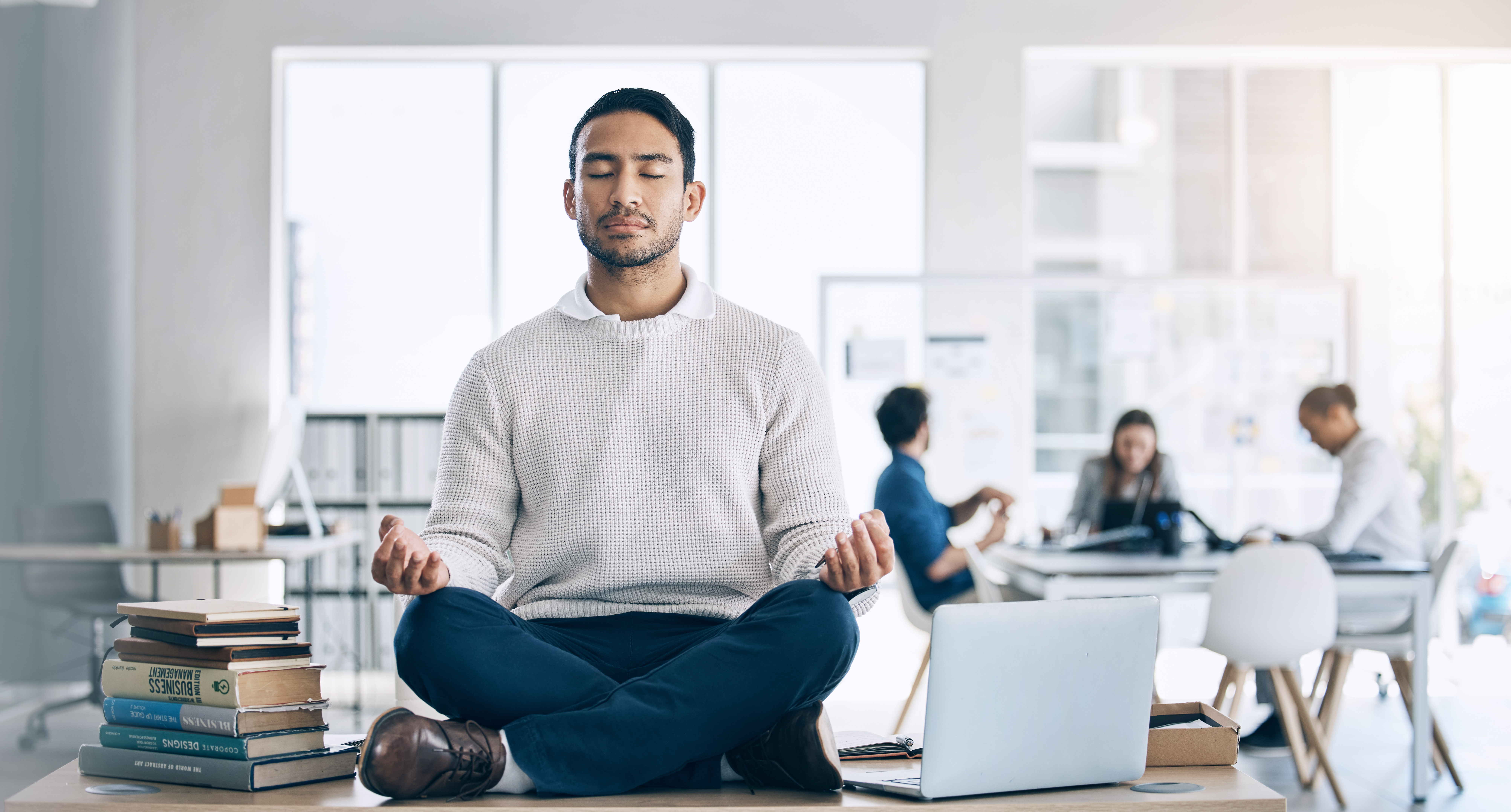 businessman meditation and yoga on desk at startu 97c7cdb5d0289c2bb18c