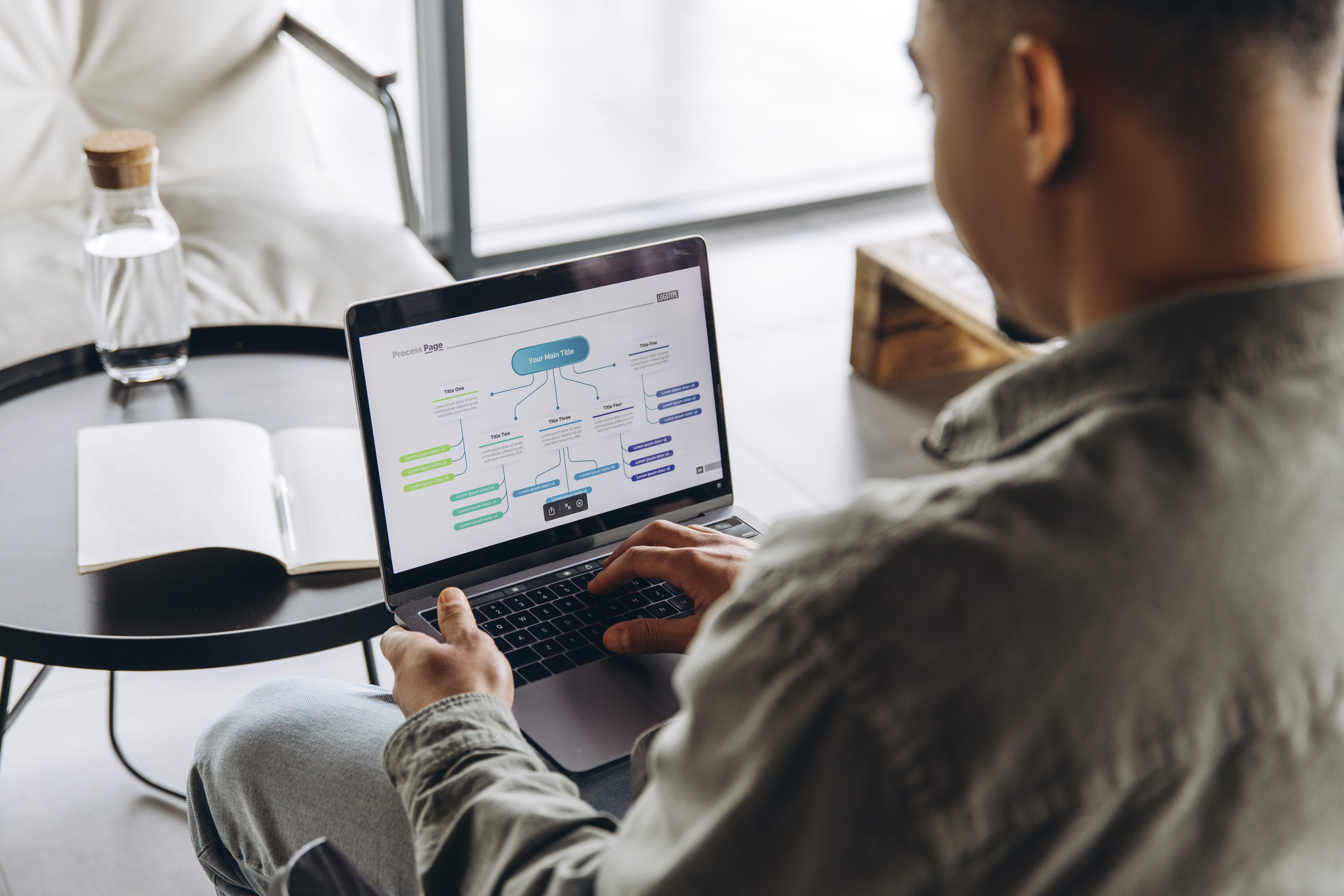 businessman working on flowchart presentation on l 59bef17c18725278ae7a