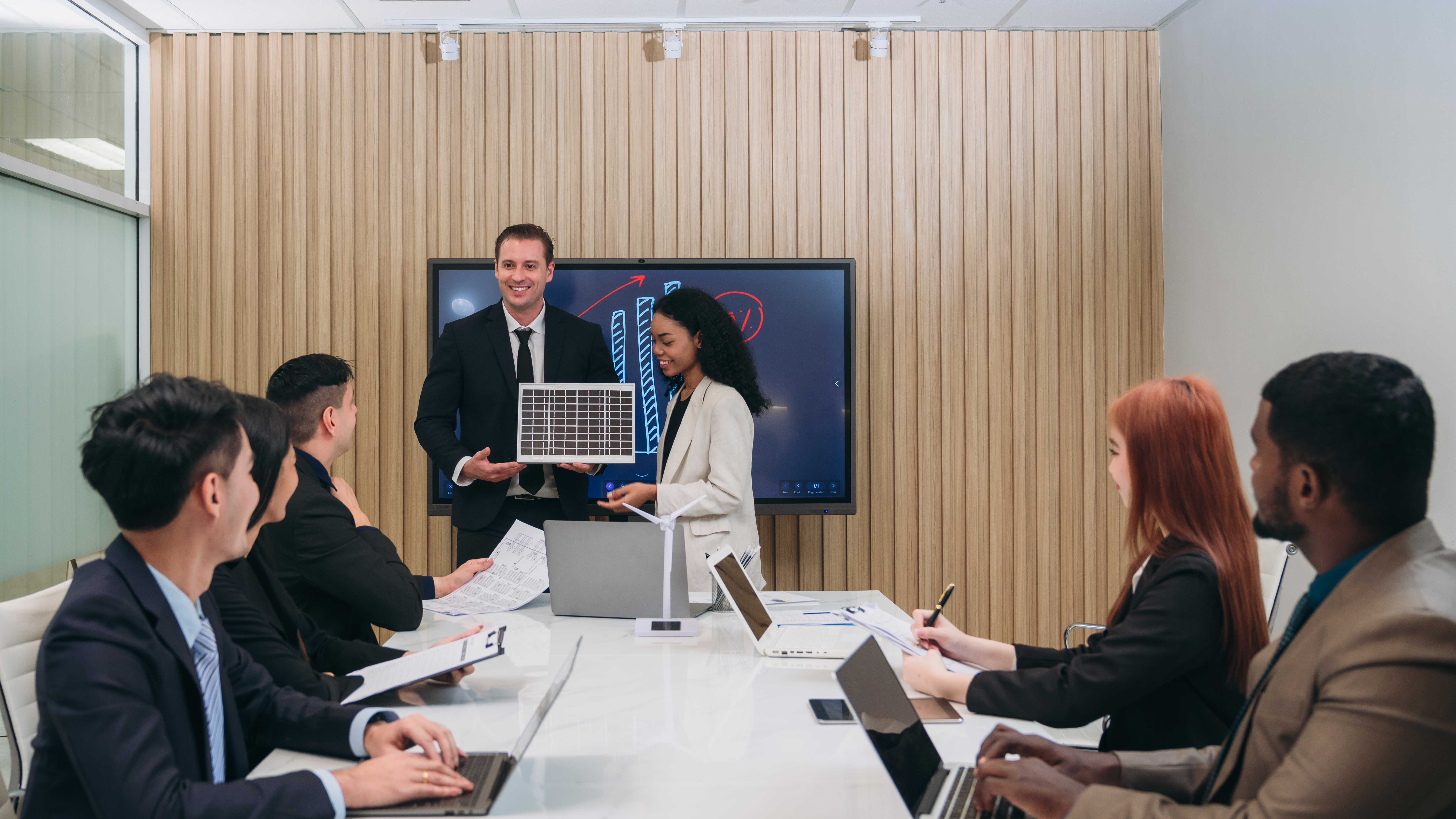 businesspeople discussing during meeting in confer 000c28fa96774cb1af0e