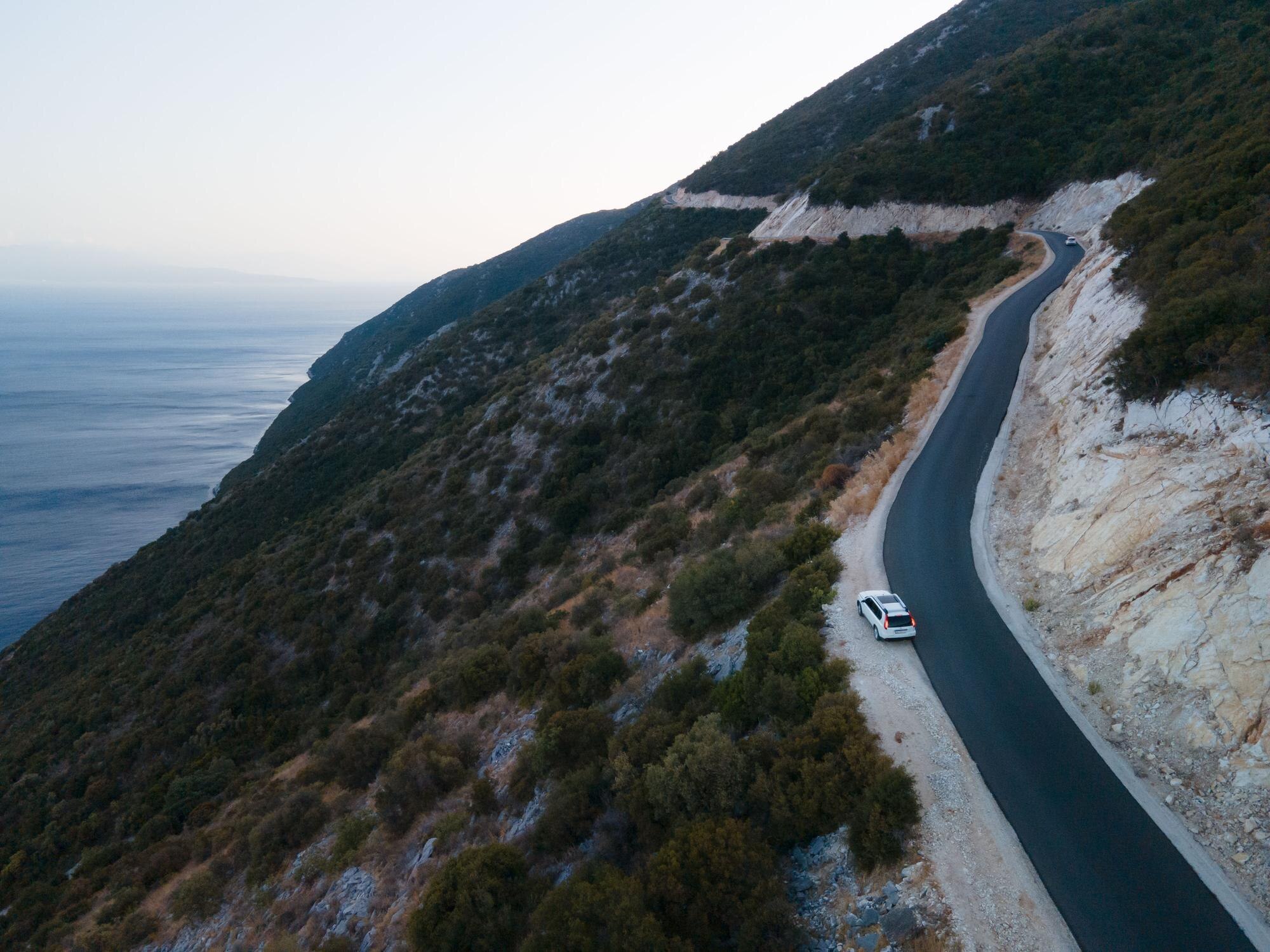 Craft your dream self-drive adventure: mix smart planning with the freedom to roam 3 car travel concept moving by road in mountains wit 066b75a05d7ebb17f09b BTOURS