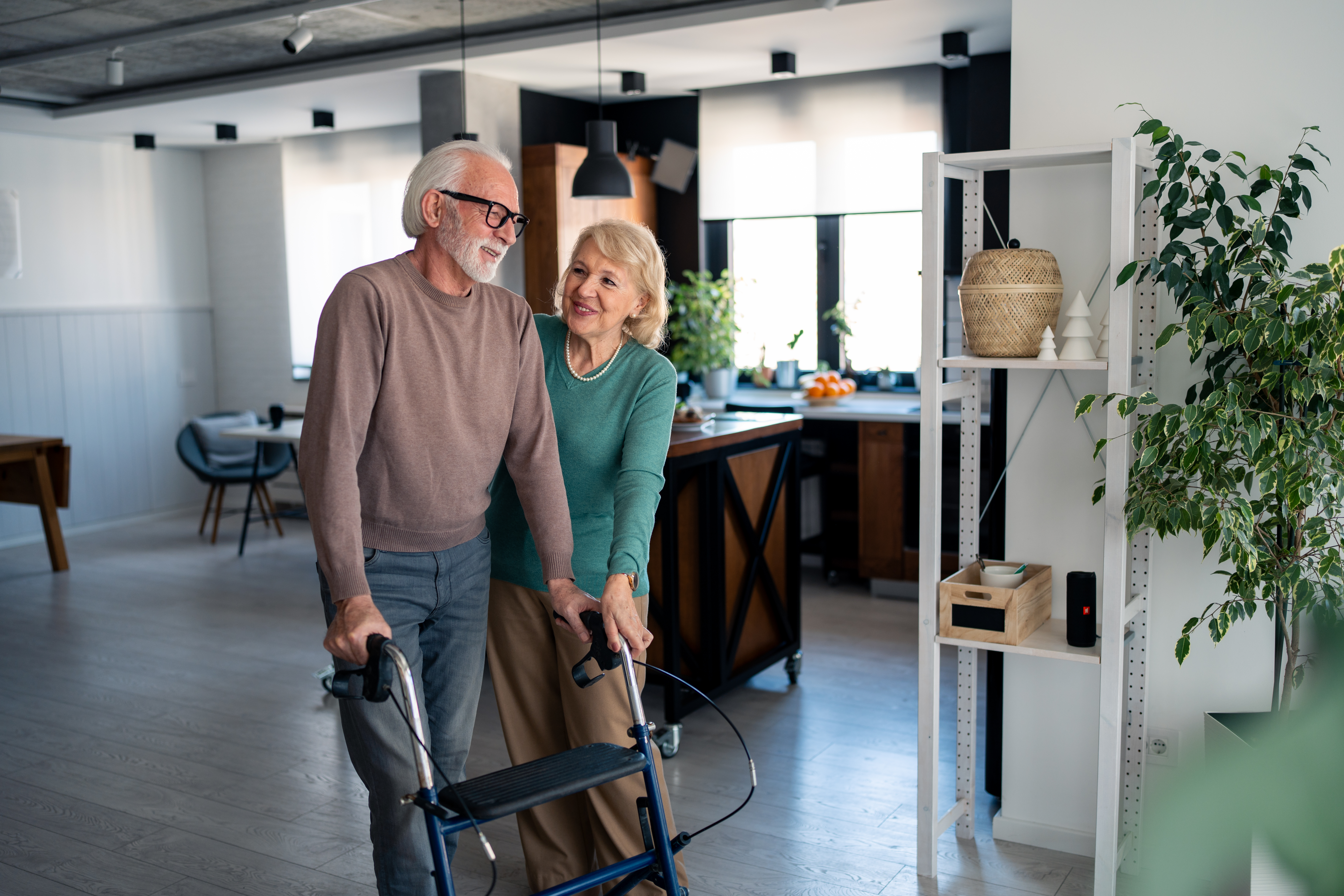 caring caucasian woman assisting elderly husband w f9fca21b3fcdbd5c0fa7