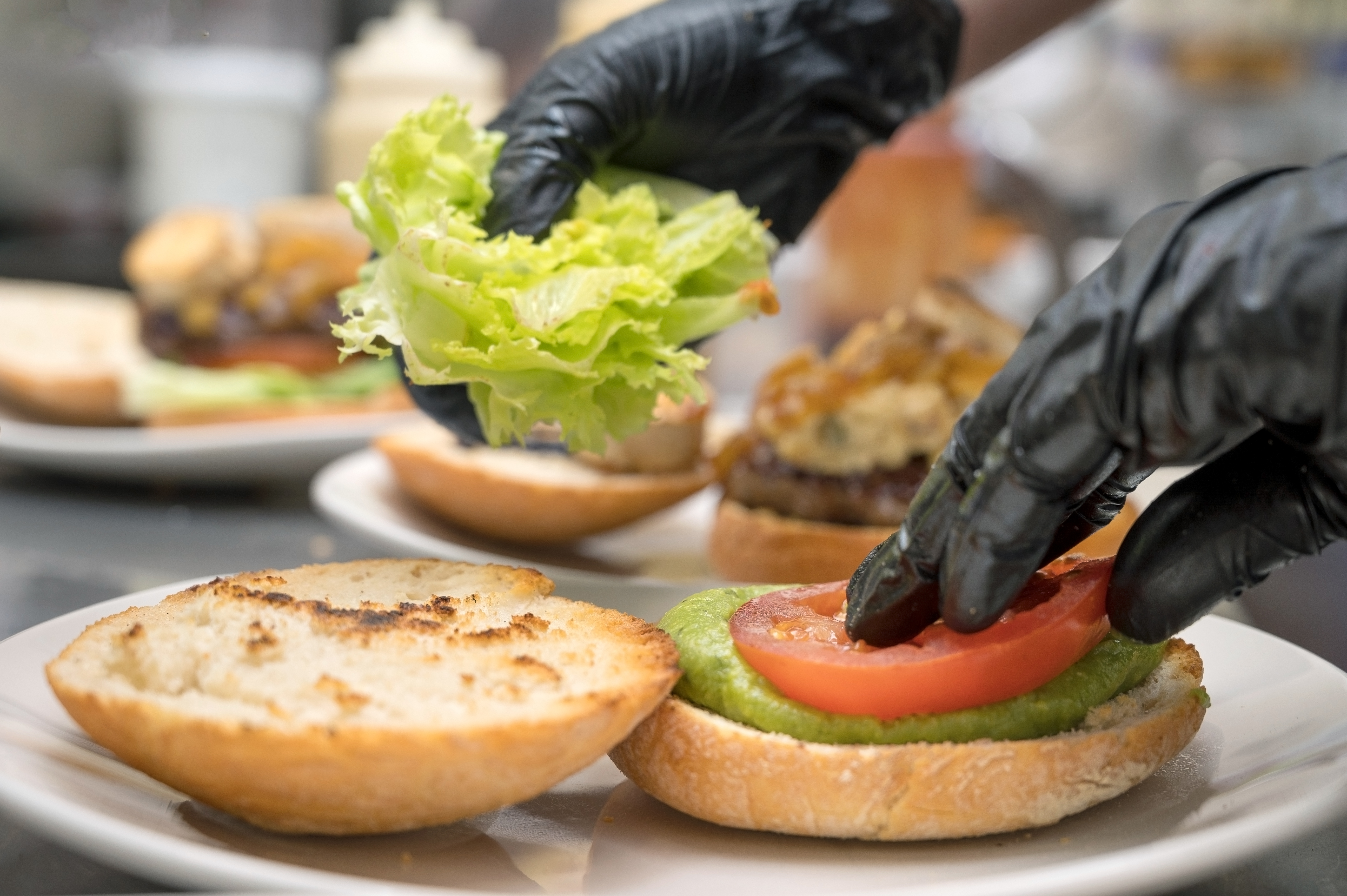 chef cooking burger close up making sandwich fa 8a181b69730d6b564bb7