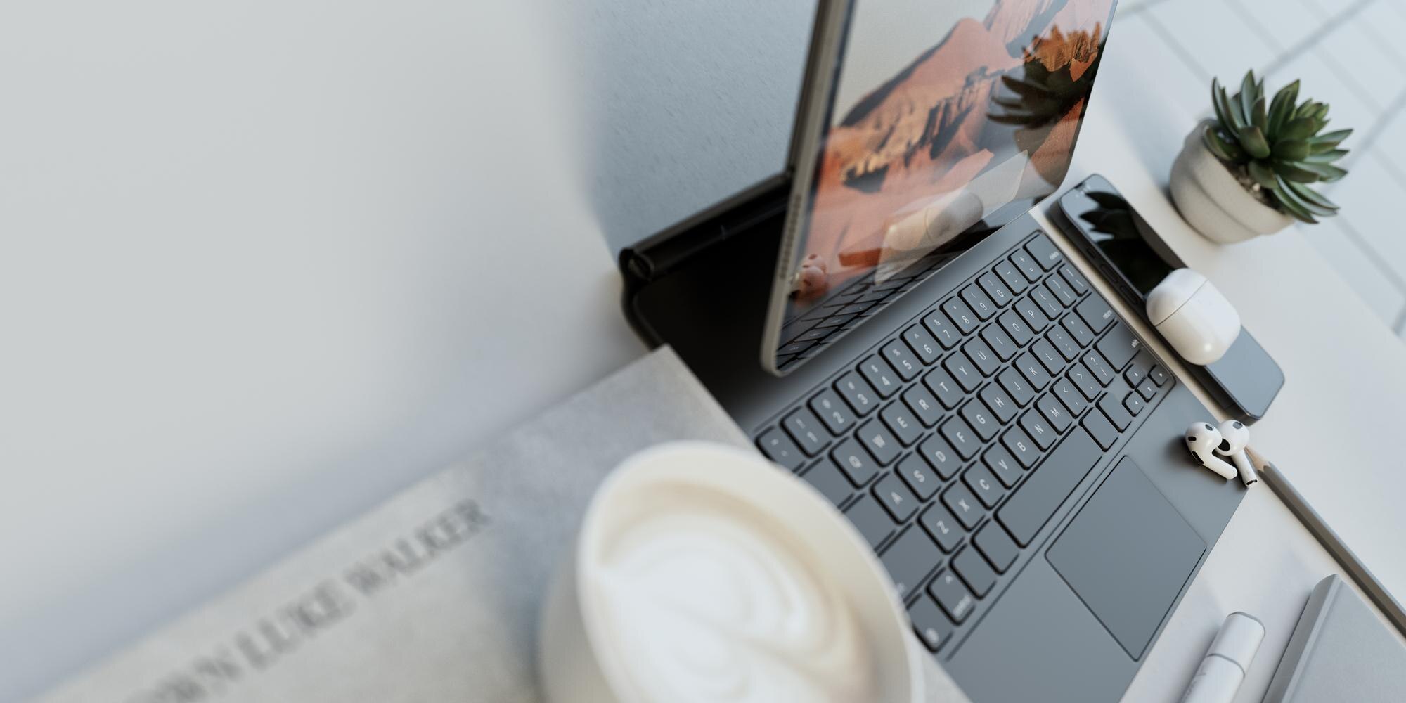 Transform Your Digital Presence: Stunning Websites Starting at $3000 16 clean white office with a laptop on the table and 9d939263db9cbf7ec91f