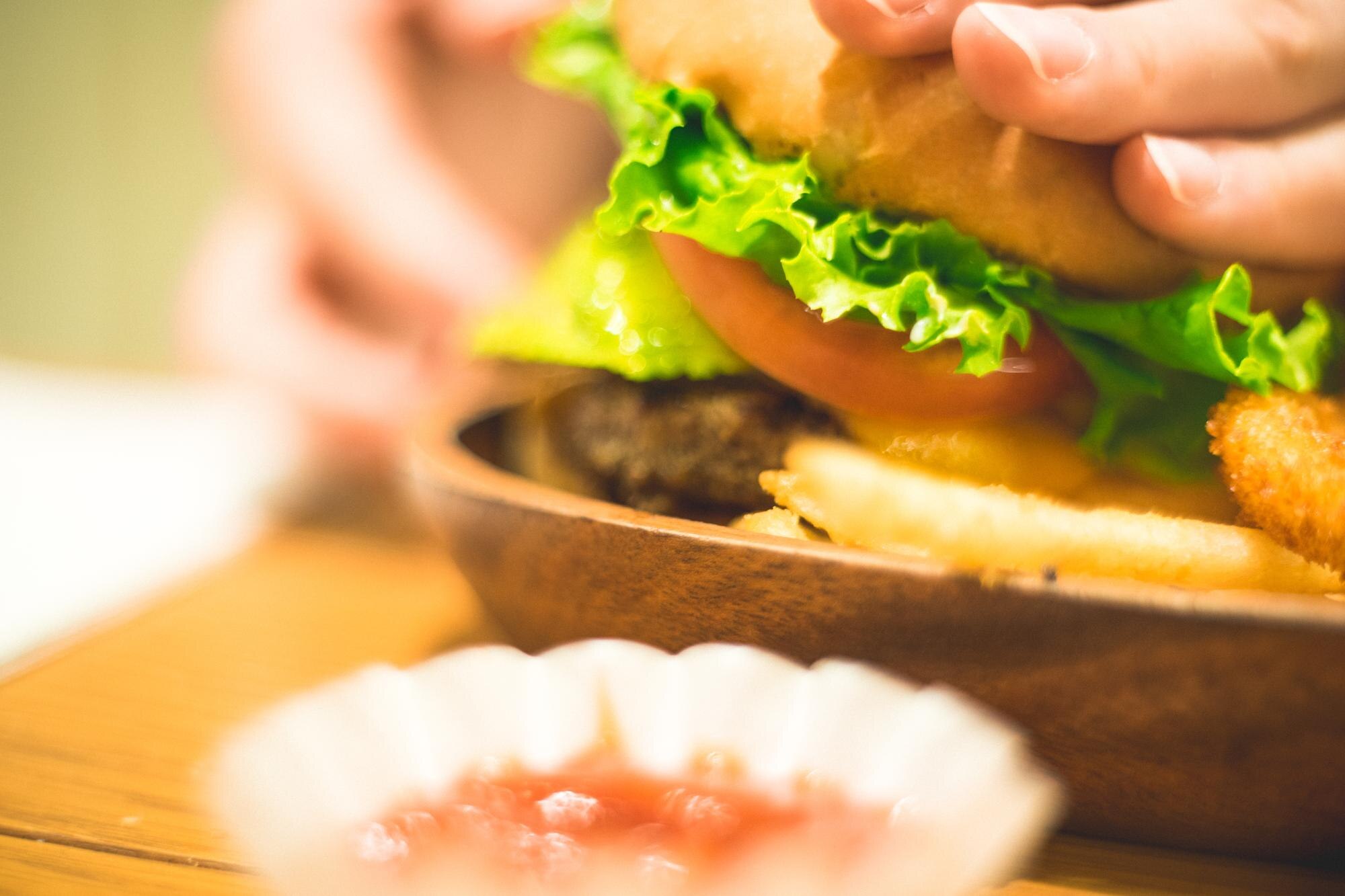 close up of burger in plate 804414fd36b7e8865db1