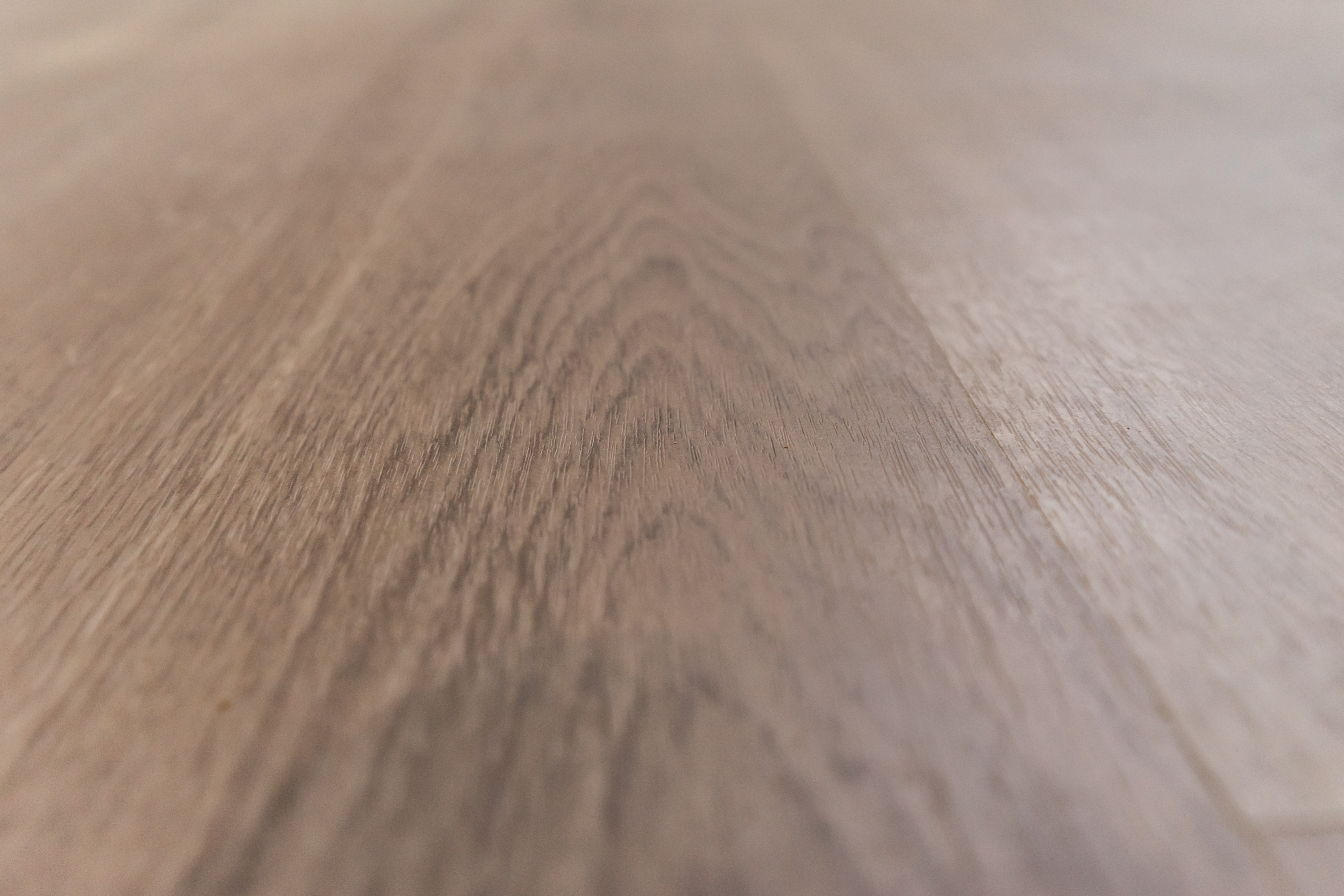 The beauty and durability of luxury vinyl plank flooring in dc metro 1 Close up of installed laminate wood flooring with 83ce6612efd433e5acd9