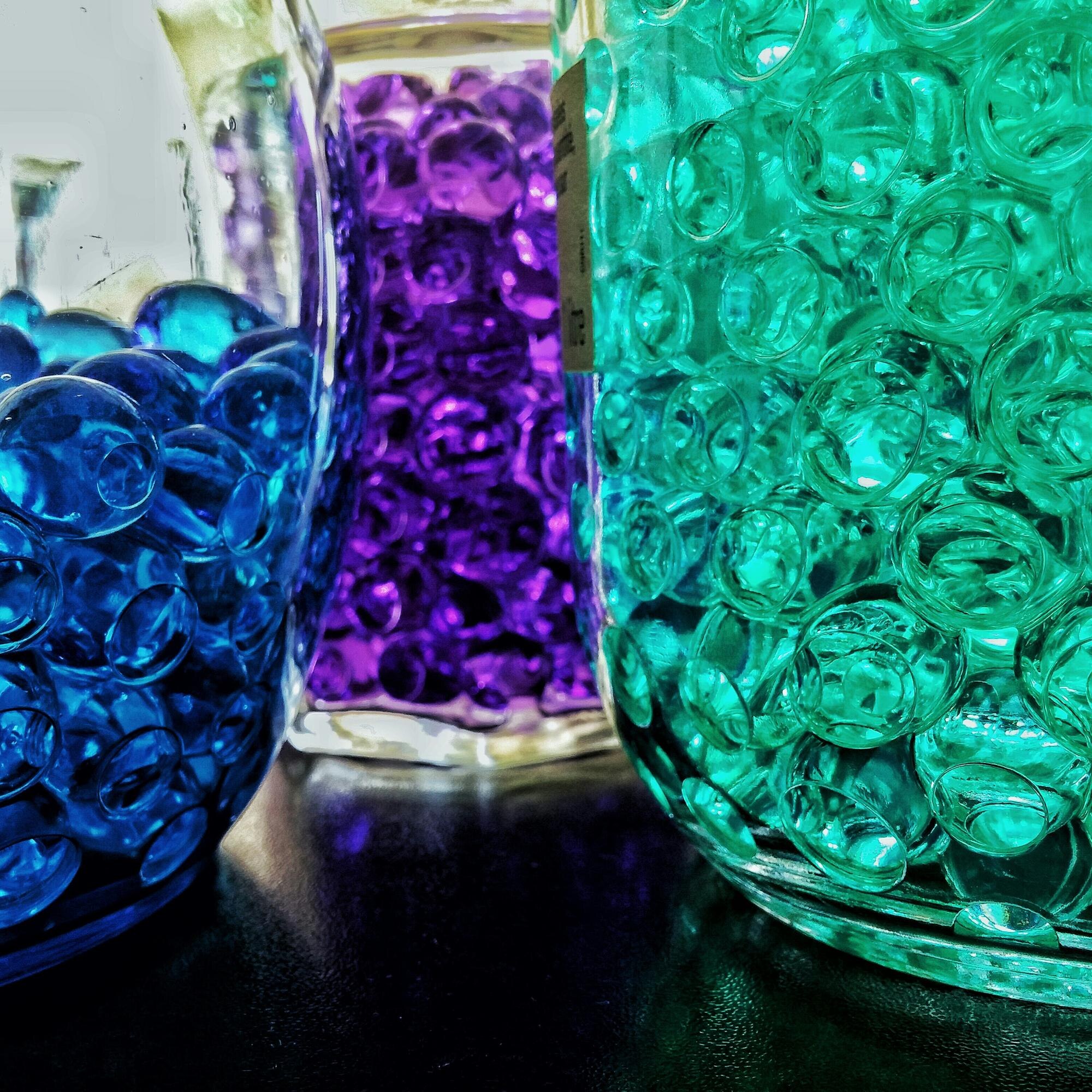 Choosing the Right Plastic for Long-Lasting Performance: A Practical Guide for Trade and DIY 1 close up of multi colored beads in glass bottle 65dad010da689ca2ab46