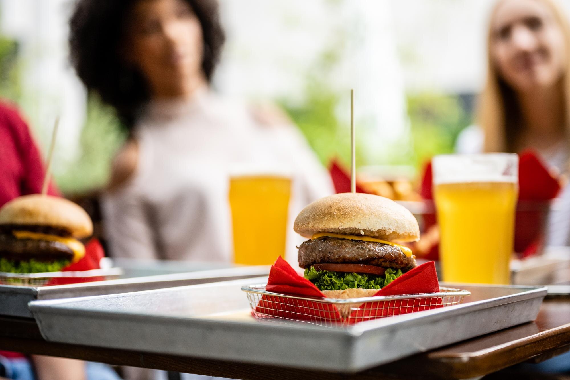 Family-Owned Fast Food: Where Quality Meets Heartfelt Care 3 close up of a classic american hamburgher backgro 9215e44f674d71e0a0e5