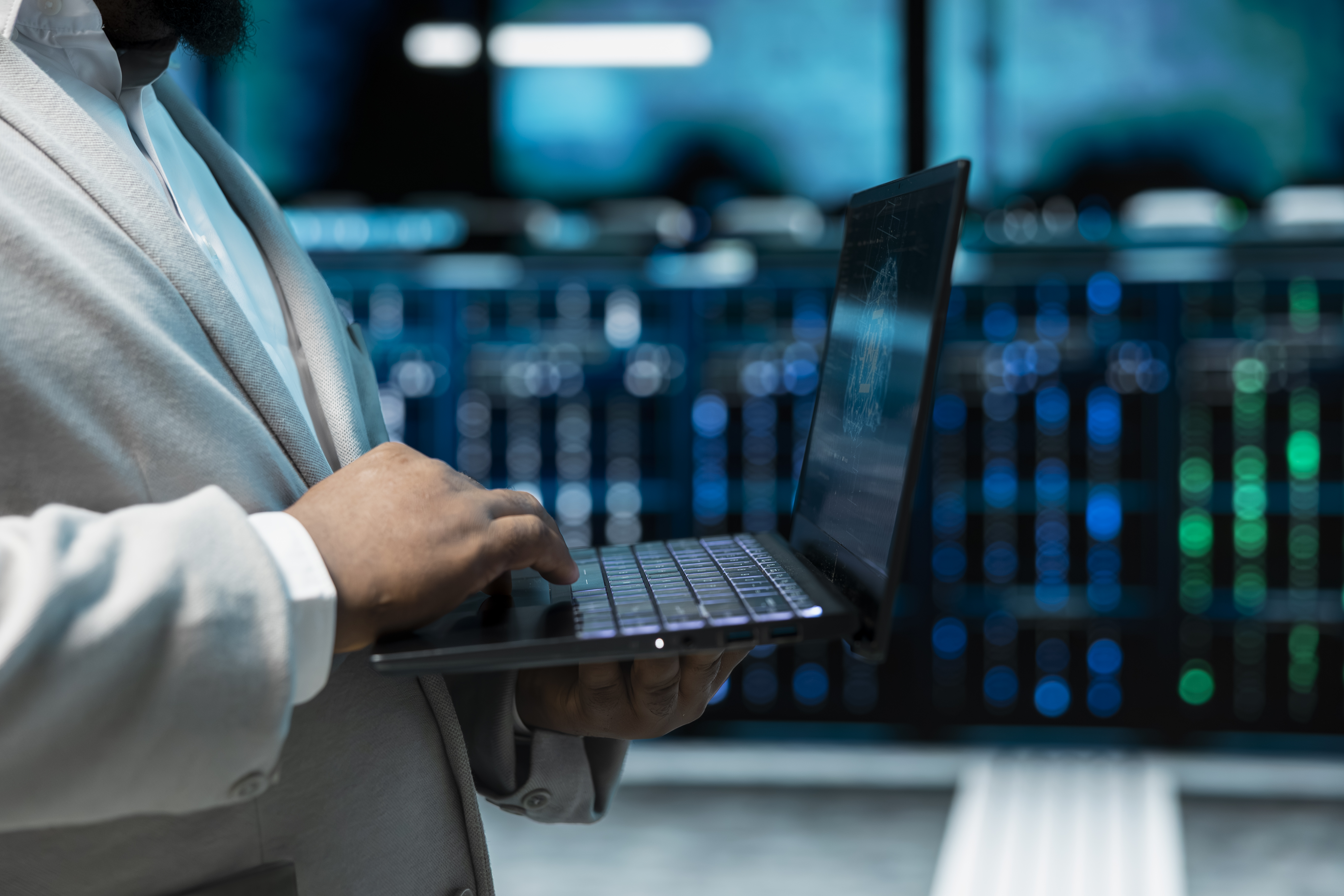 close up of admin programming in ai data center e90ff1d10e9eb464b42a