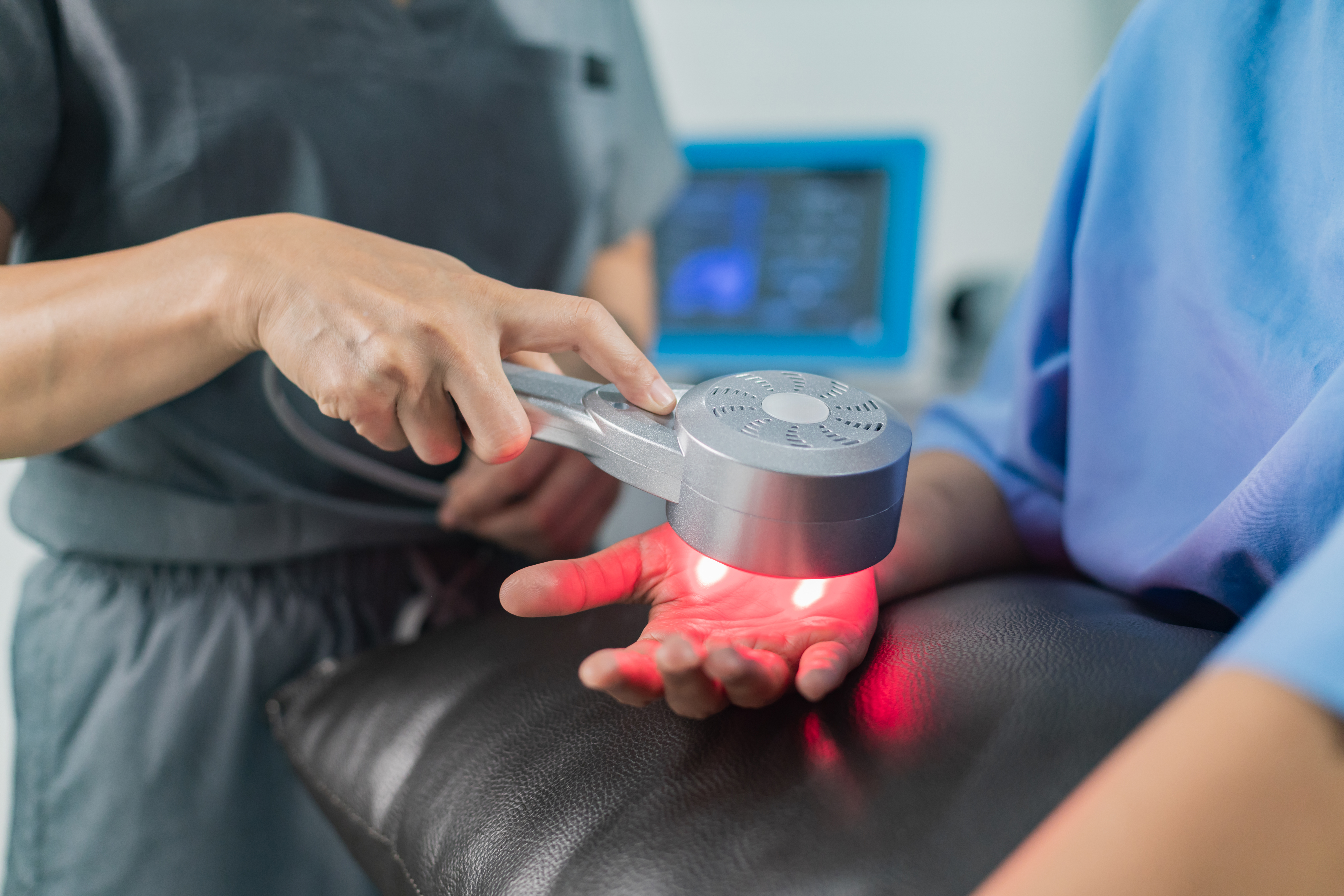 close up of high power laser therapy on patient ha 29f63824ce6fd0729f9f