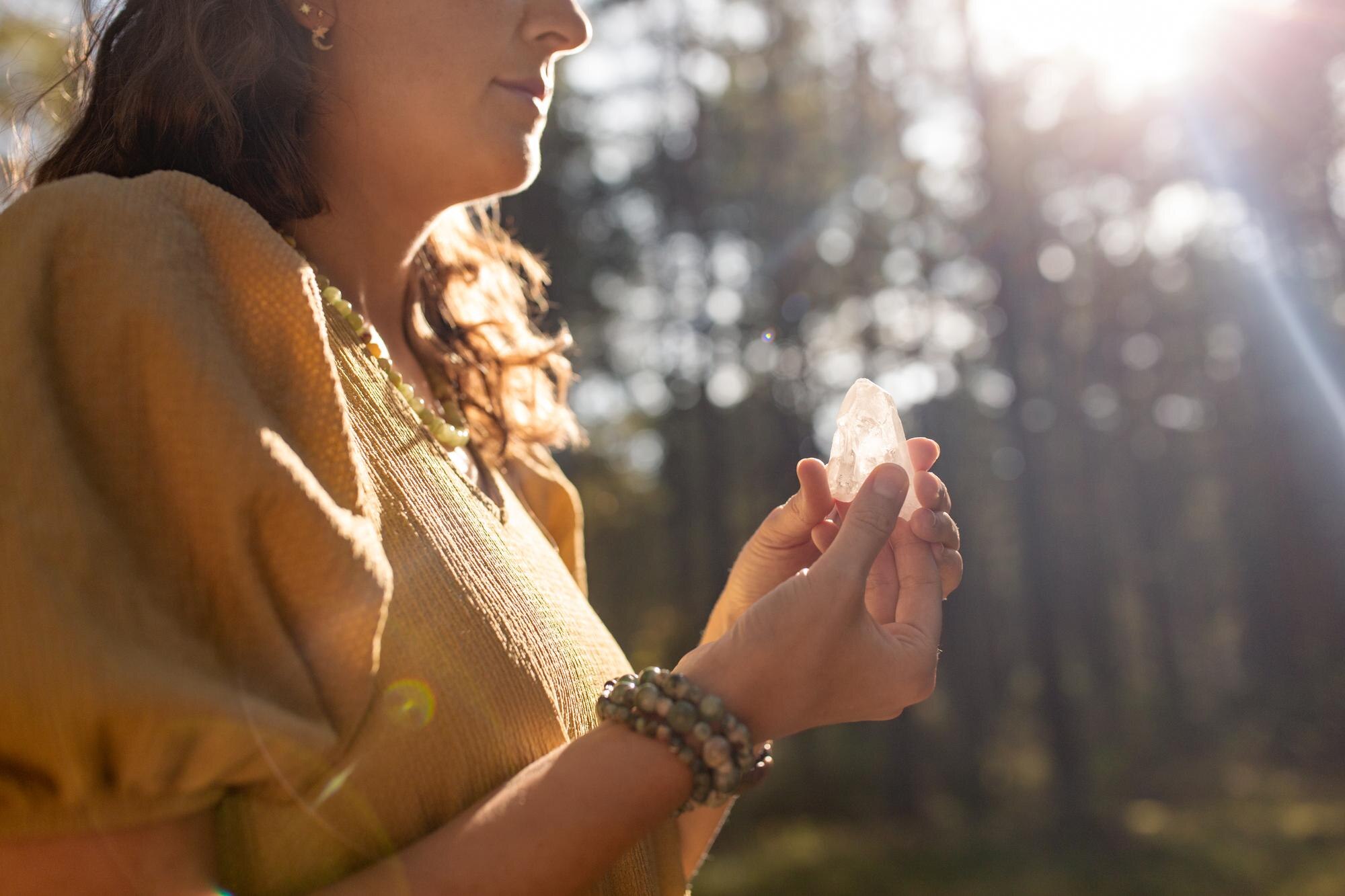 close up of woman holding magical crystal d018669738974757149e