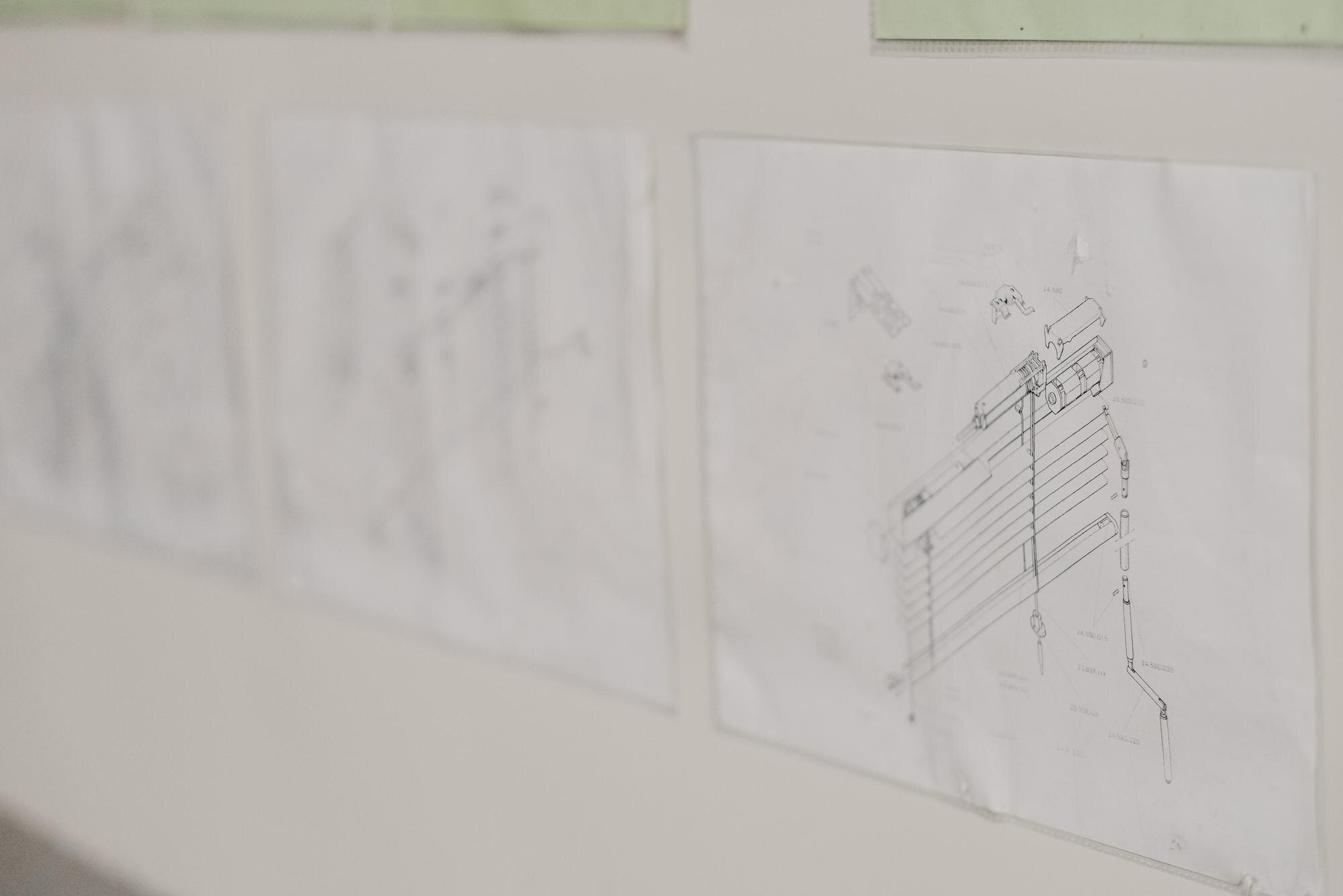 closeup shot of the blueprints of a mechanism hung 00b7e703f9e25992c273