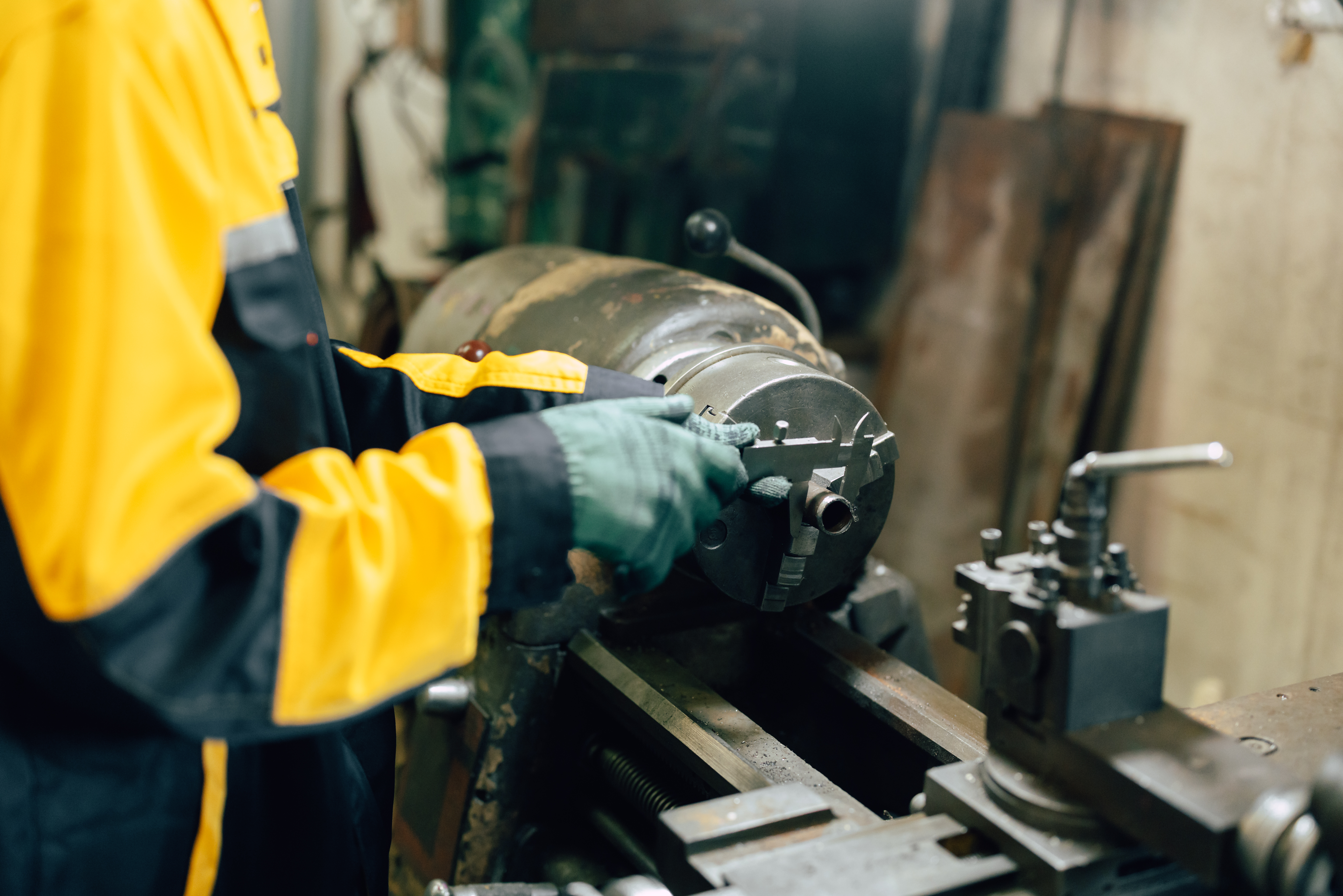 The hidden costs of ignoring fabrication accuracy in plastic products 1 closeup worker hand using vernier caliper measurin 6efd1fa71a4923a82e2f