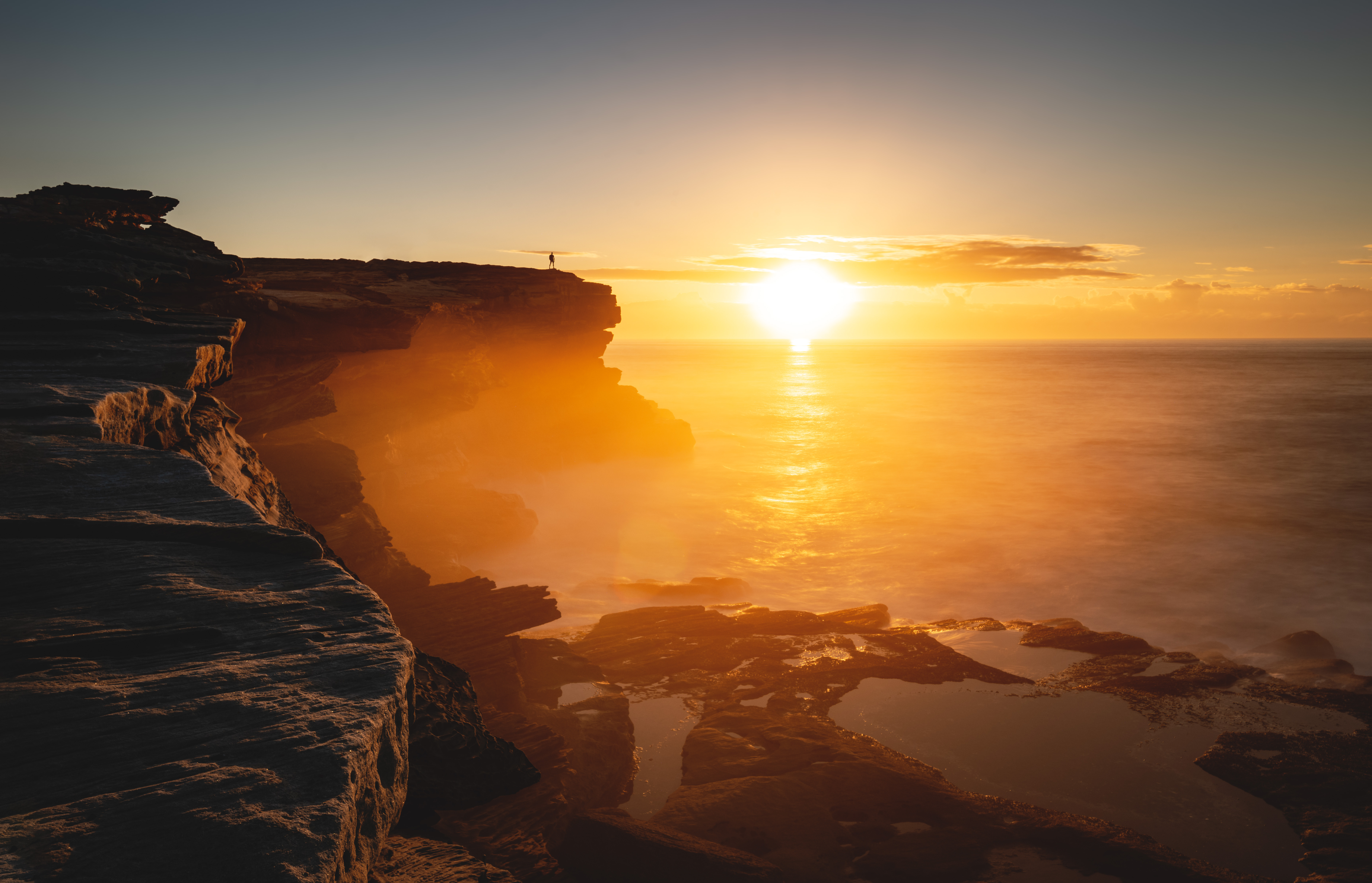 coastal sunrise above ocean horizon with silhouett e2bc5be8fff6da7cf41e BTOURS